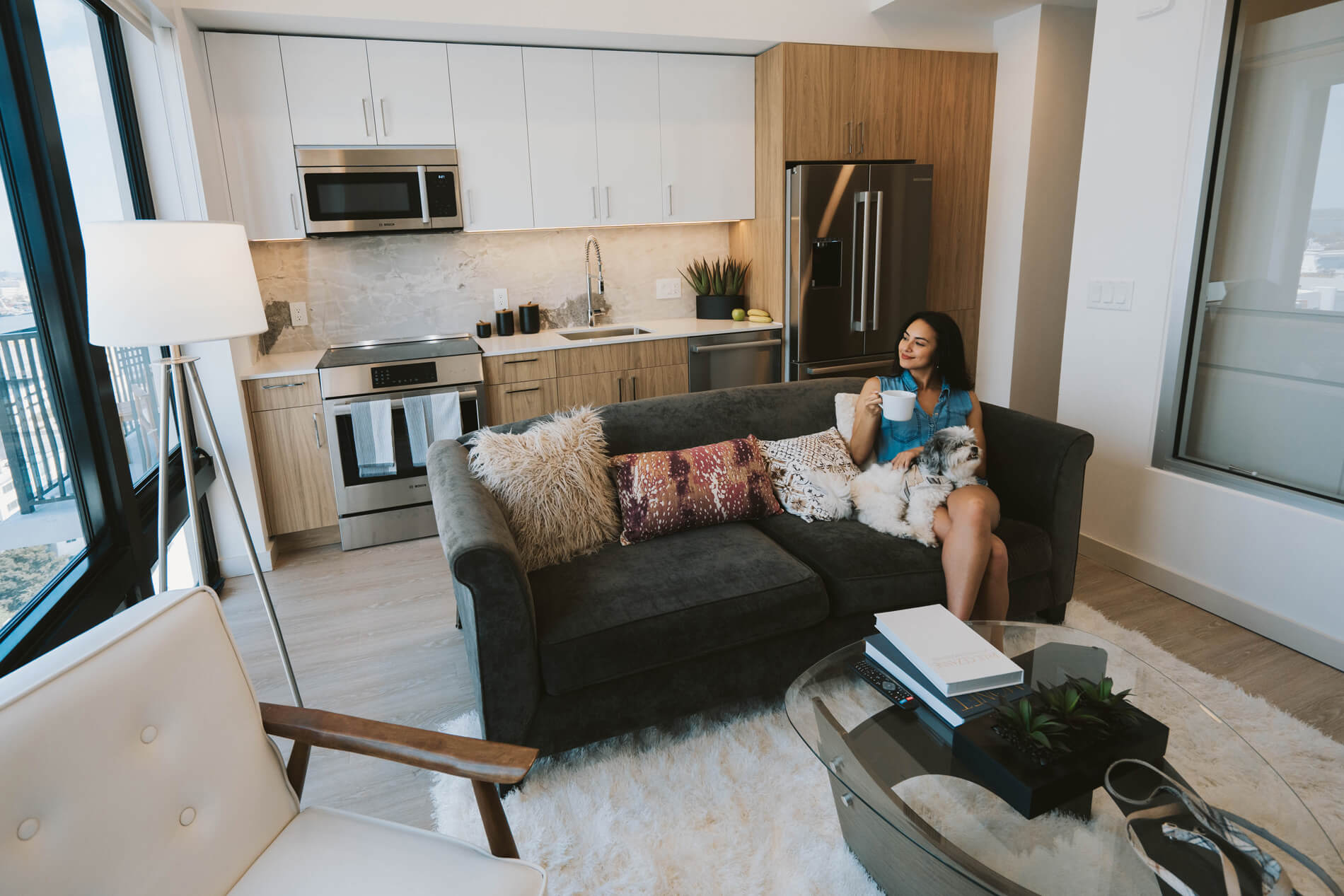101 N Meridian woman lounging in apartment