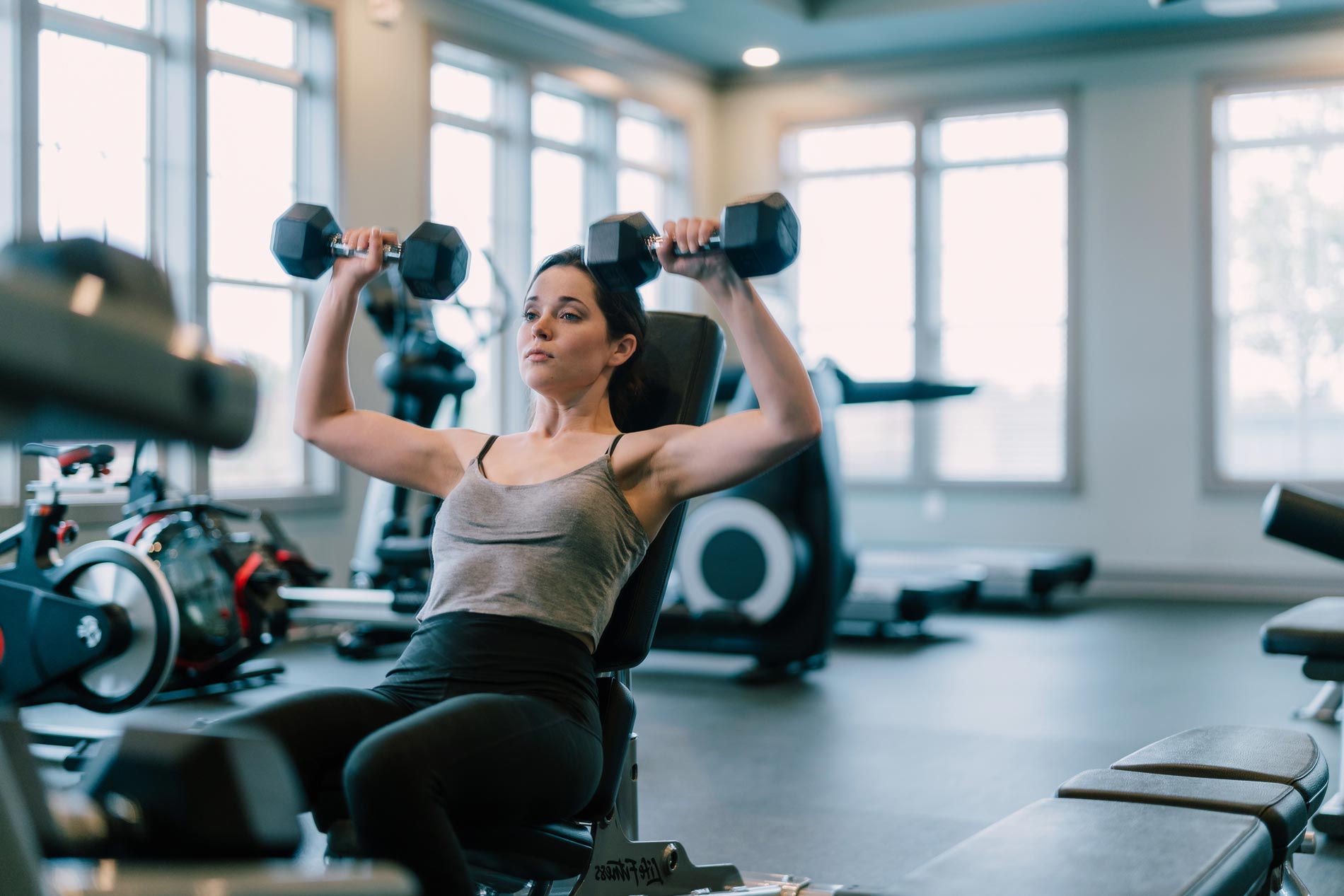 1274 At Towson Apartments Woman in Gym