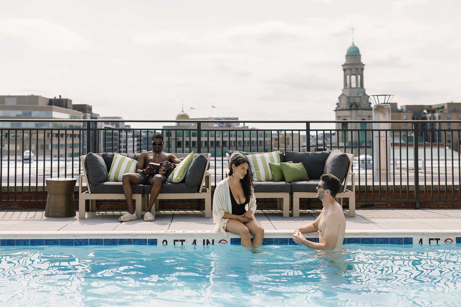1301 Thomas Circle group of friends enjoying the pool
