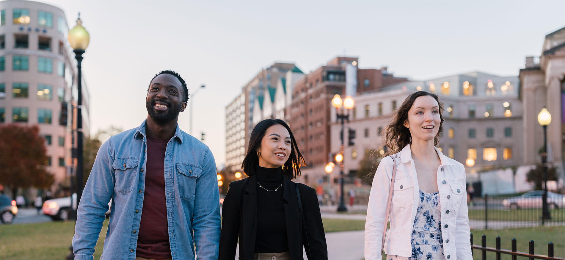 1301 Thomas Circle three friends walking downtown