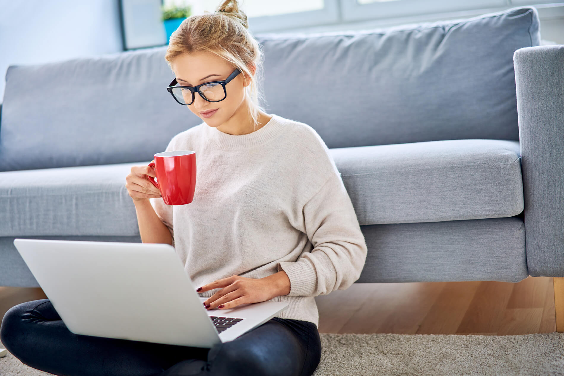 Woman looking at her laptop