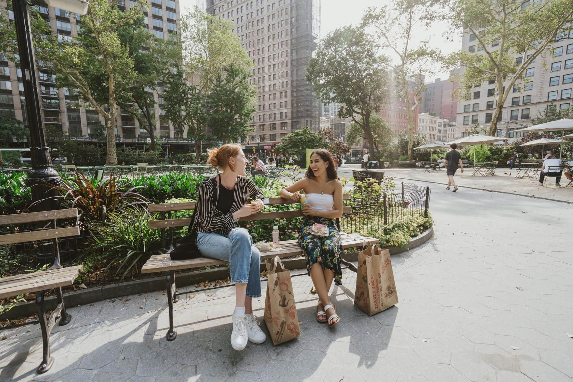 21 Chelsea two women sit on a park bench