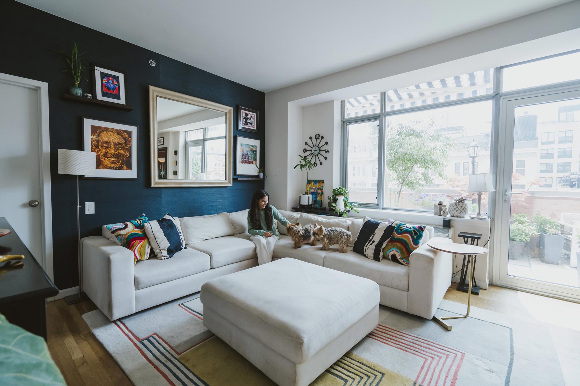 21 Chelsea woman in living room with dogs