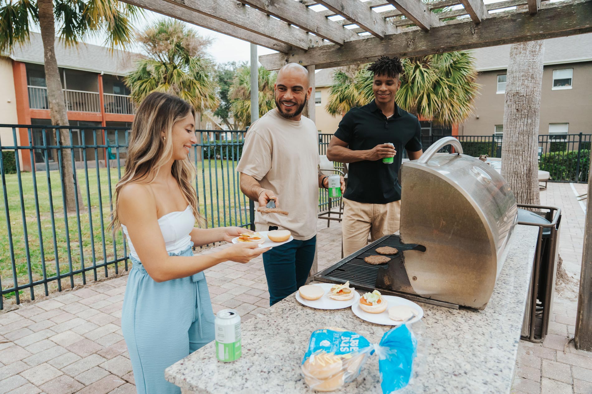 alafaya woods three people grill food