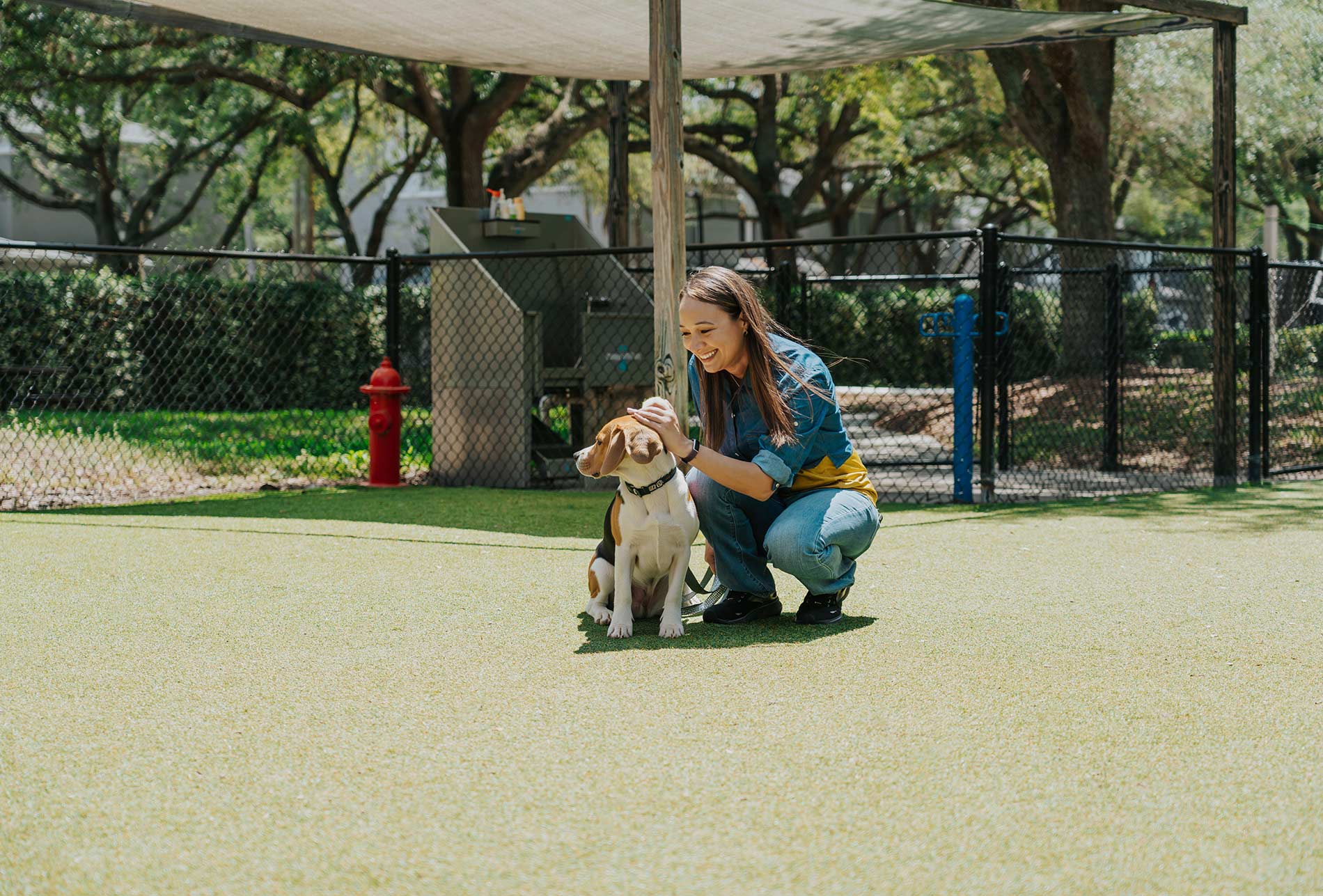 Arbors At Maitland woman with dog in dog park