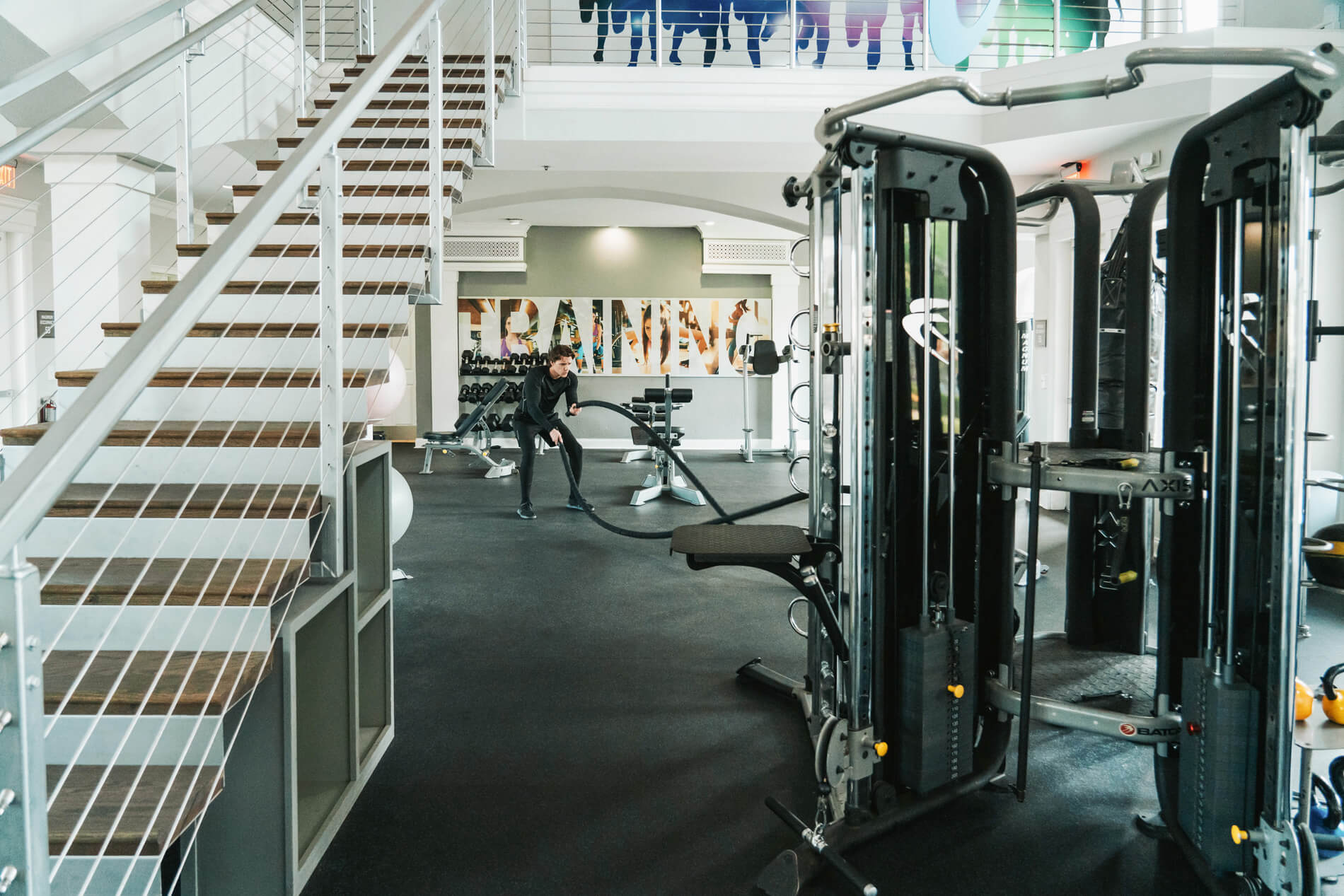 Arbors At Maitland man exercises in fitness center