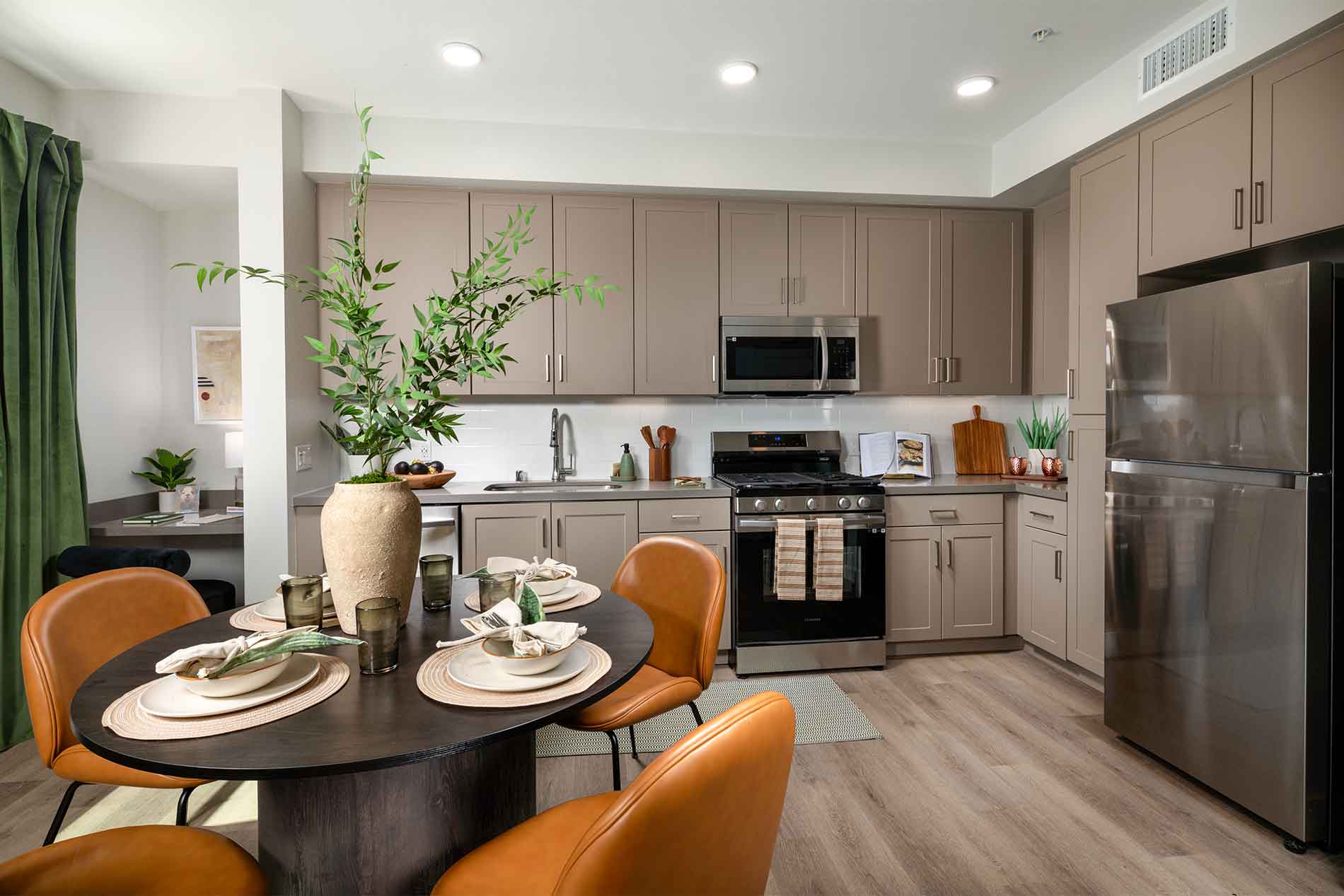 Spacious kitchen and dining area at Avena apartments in Menifee, California