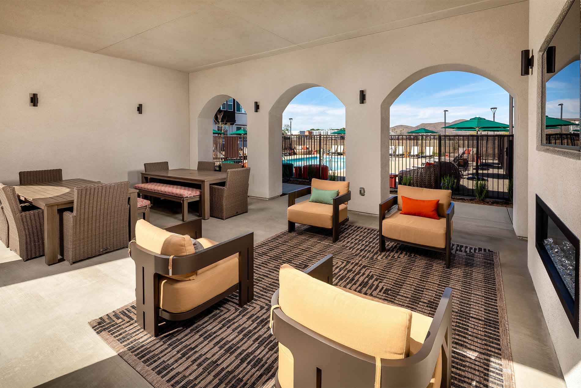 Poolside lounge area at the gated Avena community in Menifee