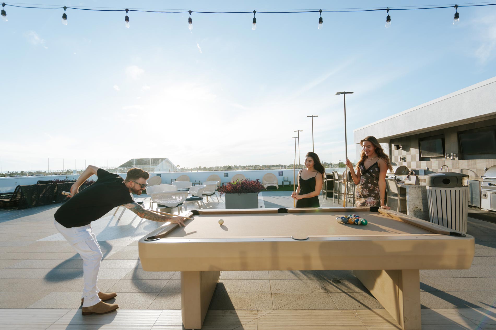 Beach and Ocean people play pool