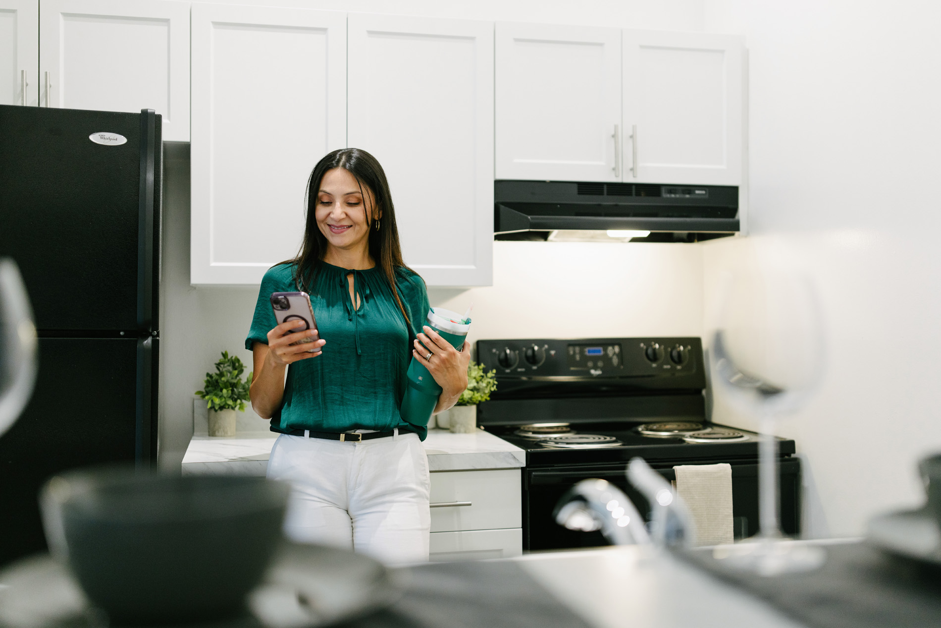 Calverts Walk woman in apartment kitchen
