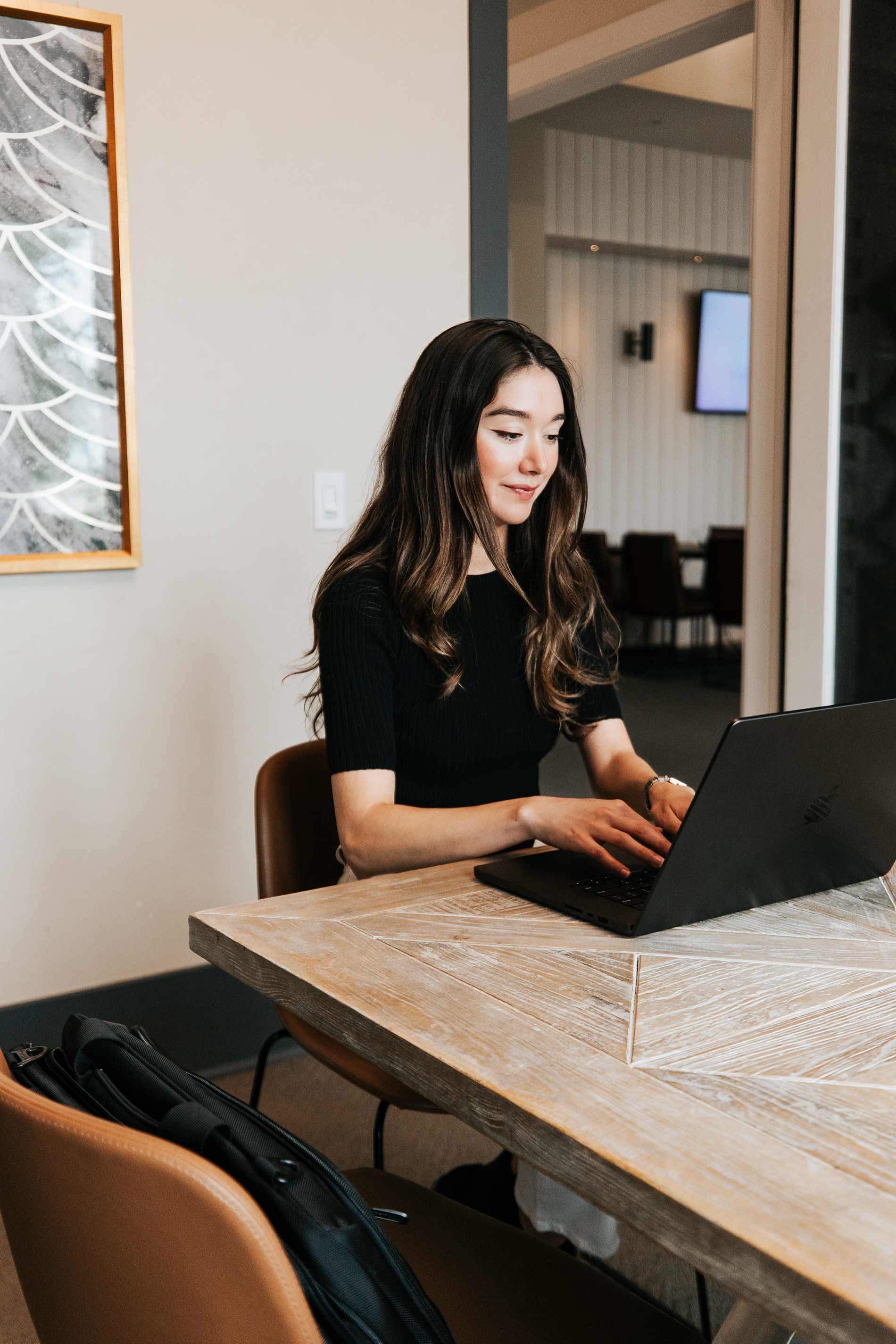 Central Square woman works in conference room