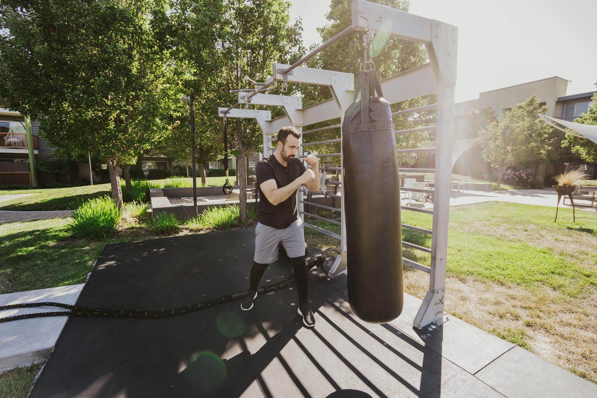 CitySouth man exercises at outdoor fitness center