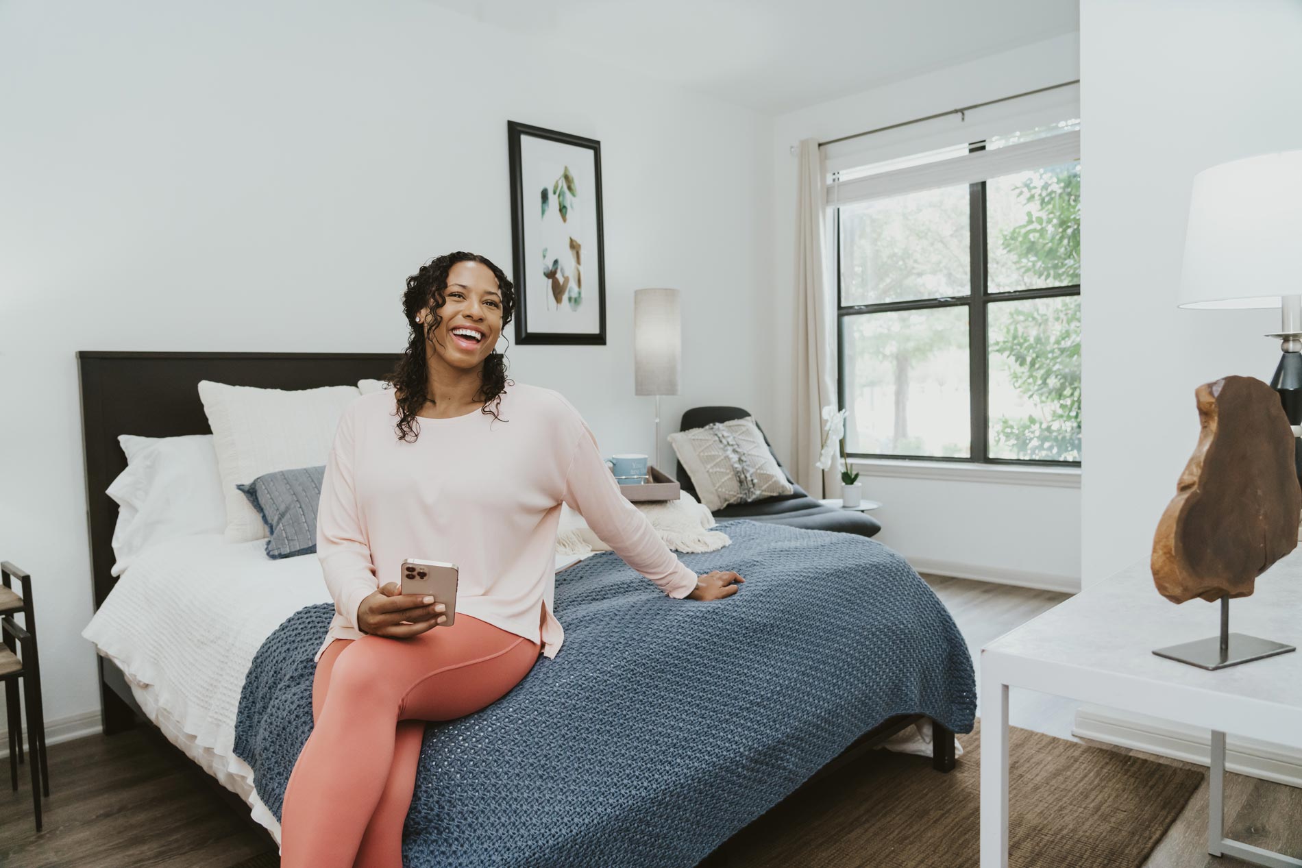 Cool Springs woman in staged bedroom