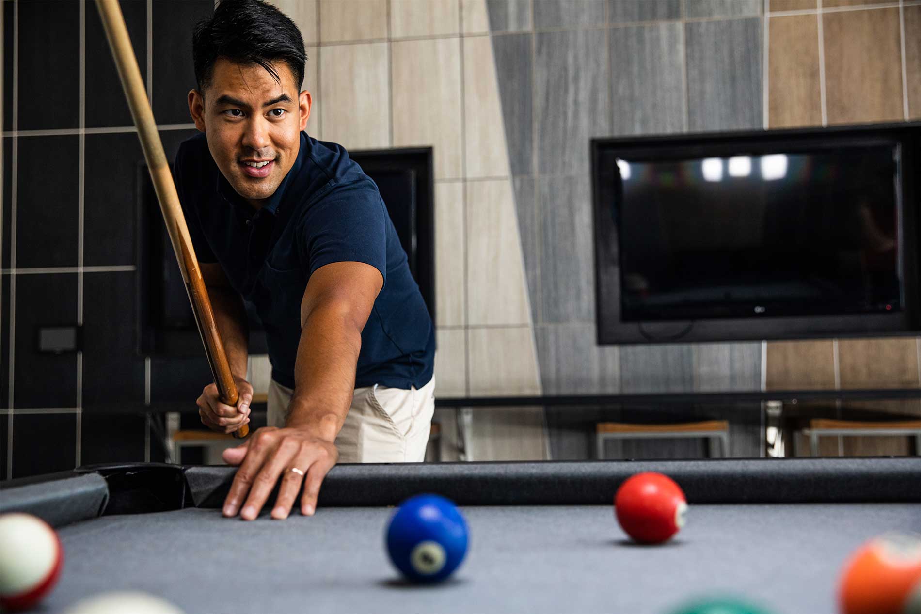 Man playing billiards