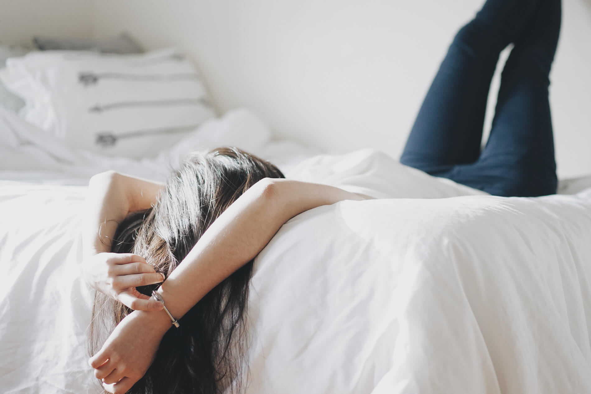 Woman laying in bed