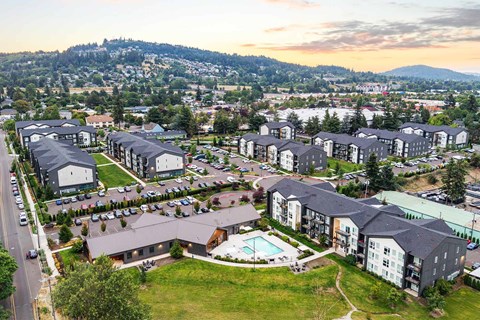 Heirloom apartment community in Portland, OR featuring a resort-style swimming pool, spa, cabanas, and sun deck