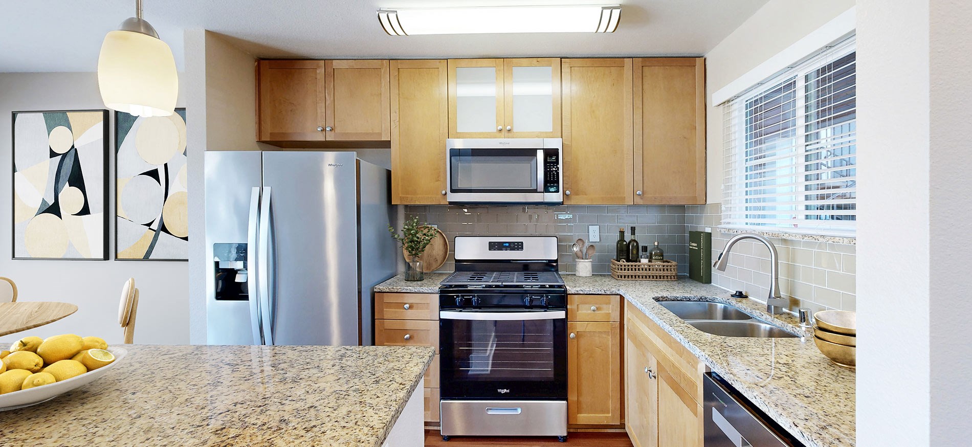 Updated kitchen at Highlands of Marin apartments in the San Rafael neighborhood of San Francisco featuring stainless steel appliances