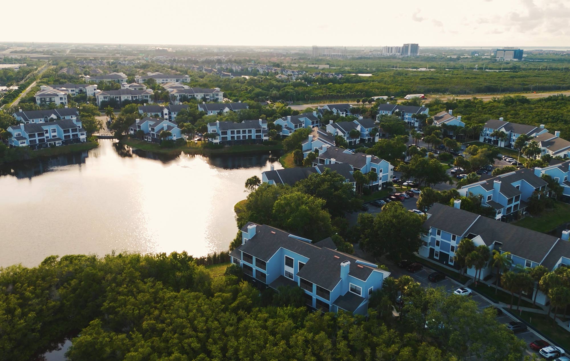 Inlet Bay aerial view of property at sunset