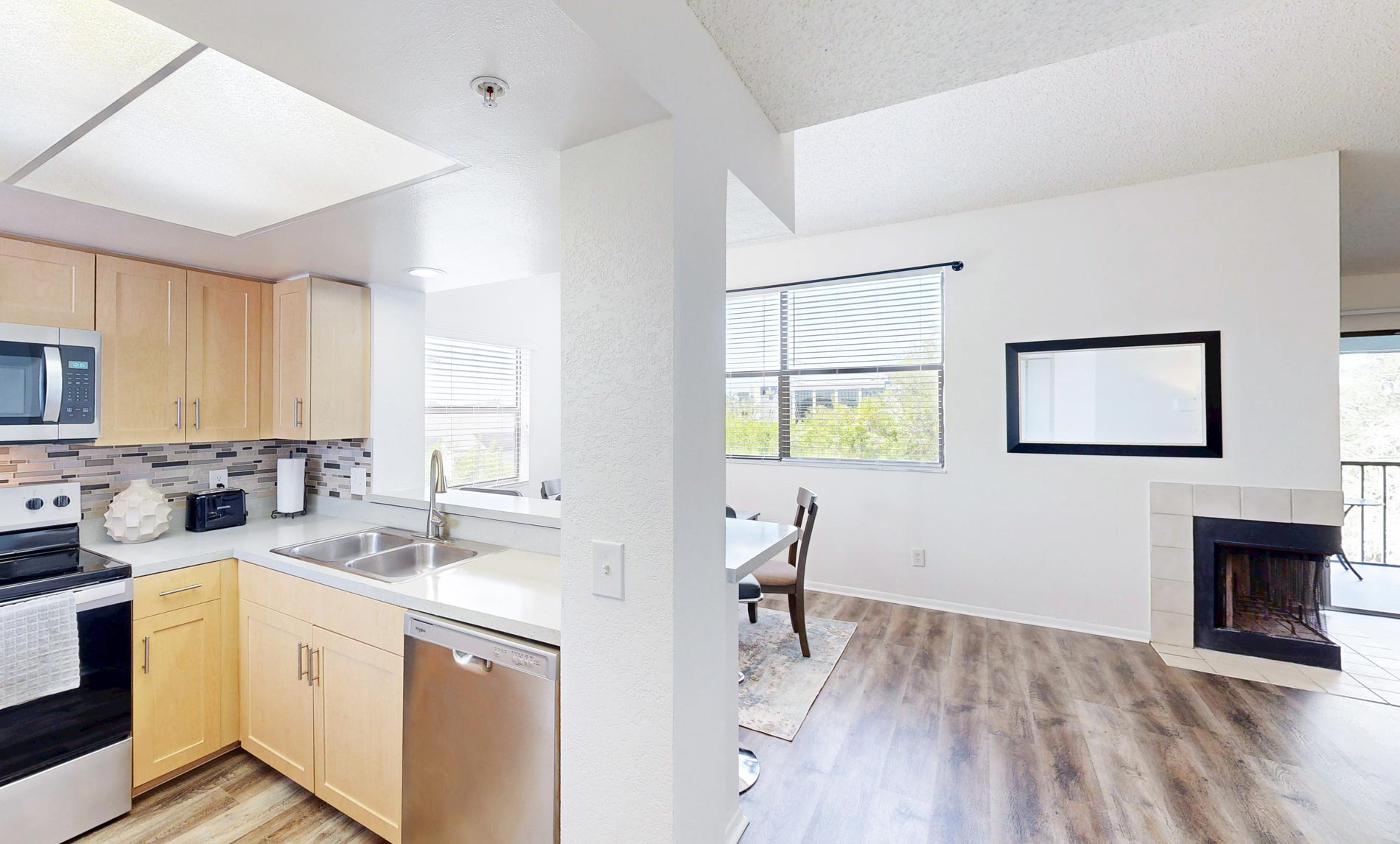 Inlet Bay staged dining room and kitchen