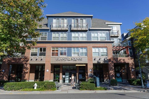 Island Square woman exits building