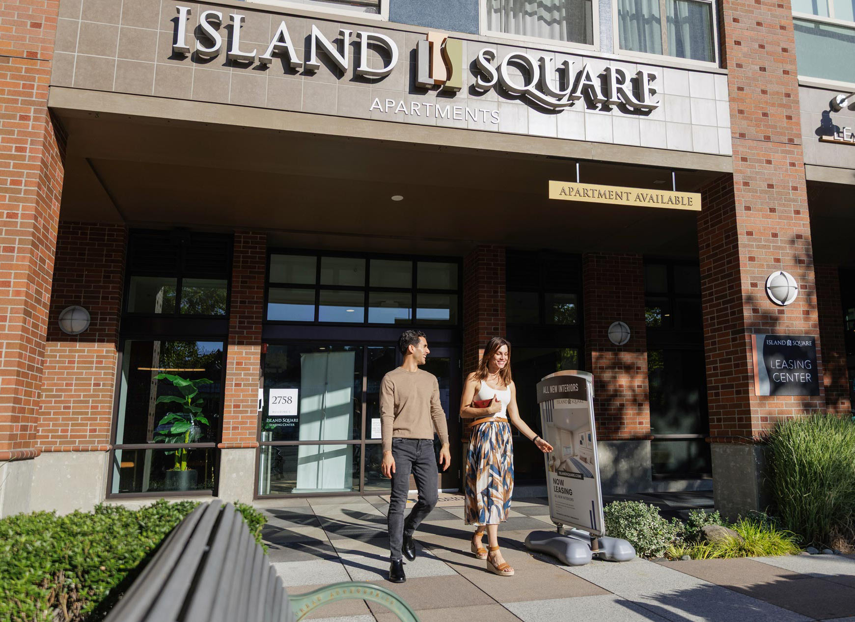 Island Square three people exit building