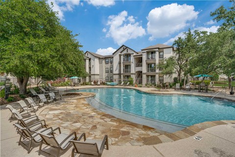 Lakeline Villas community exterior and swimming pool