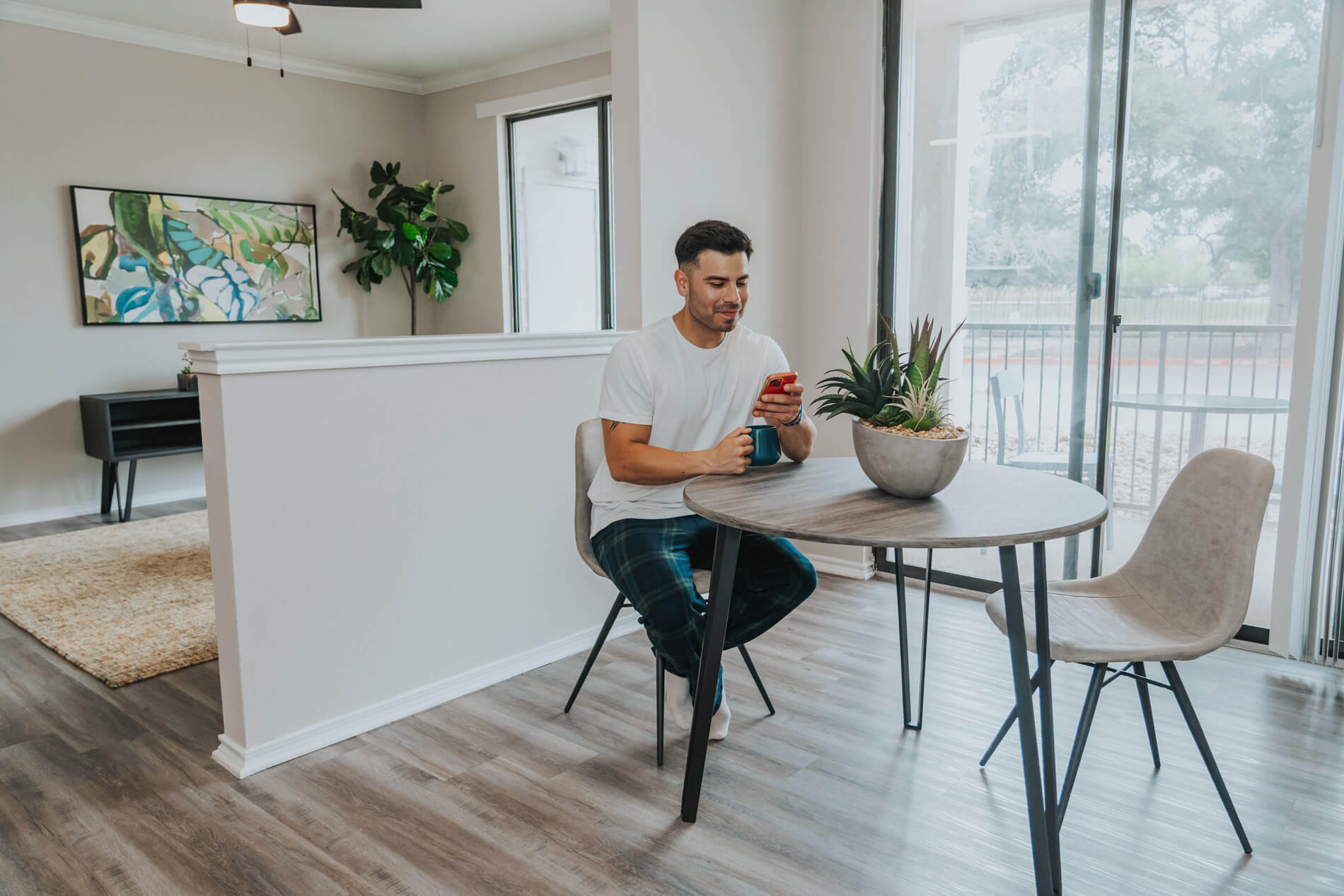 Lakeline Villas man in staged dining room