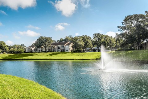 Lakewood Place building exterior and lake Lakewood Place building exterior and lake