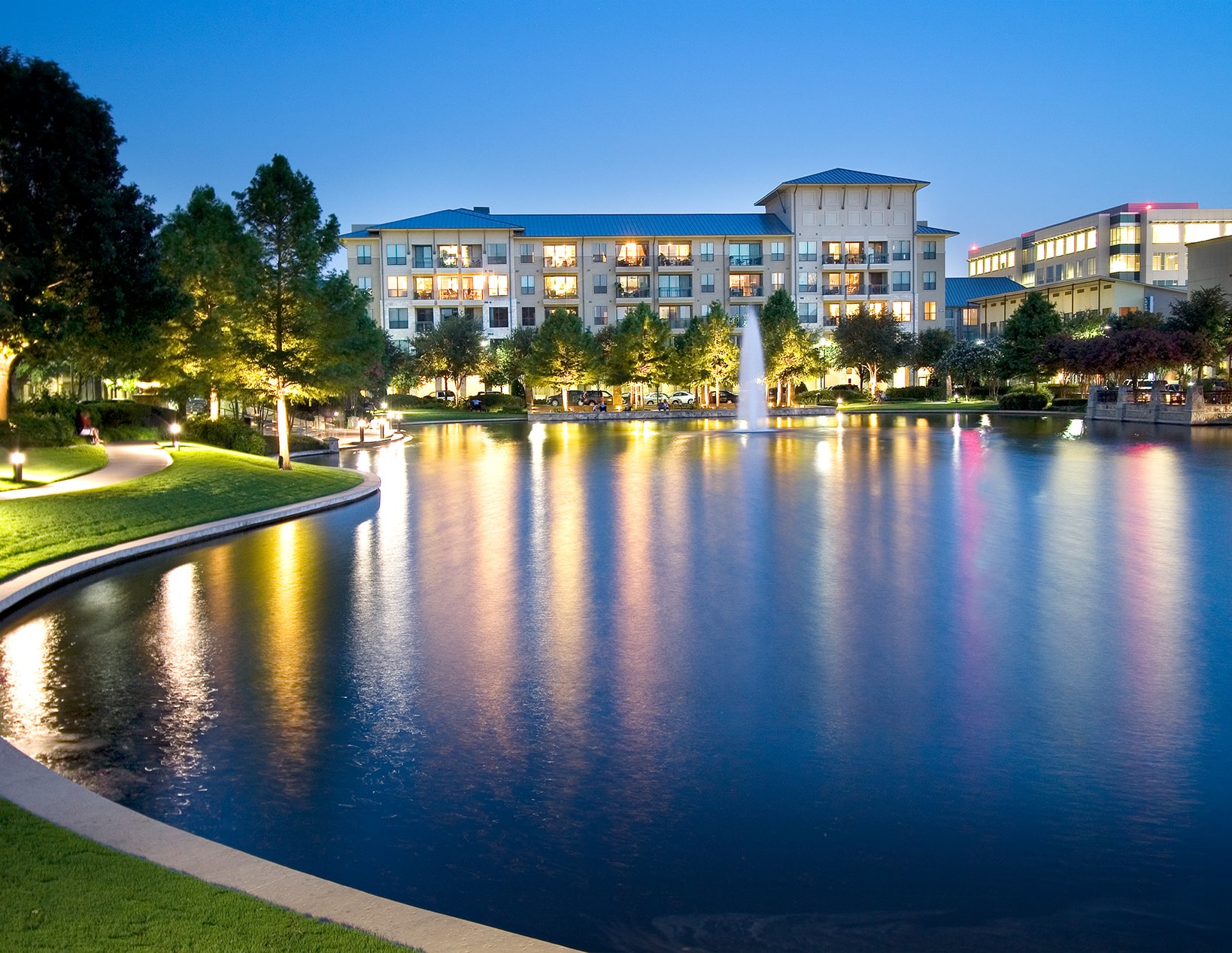 Legacy Village Building Exterior and Pond