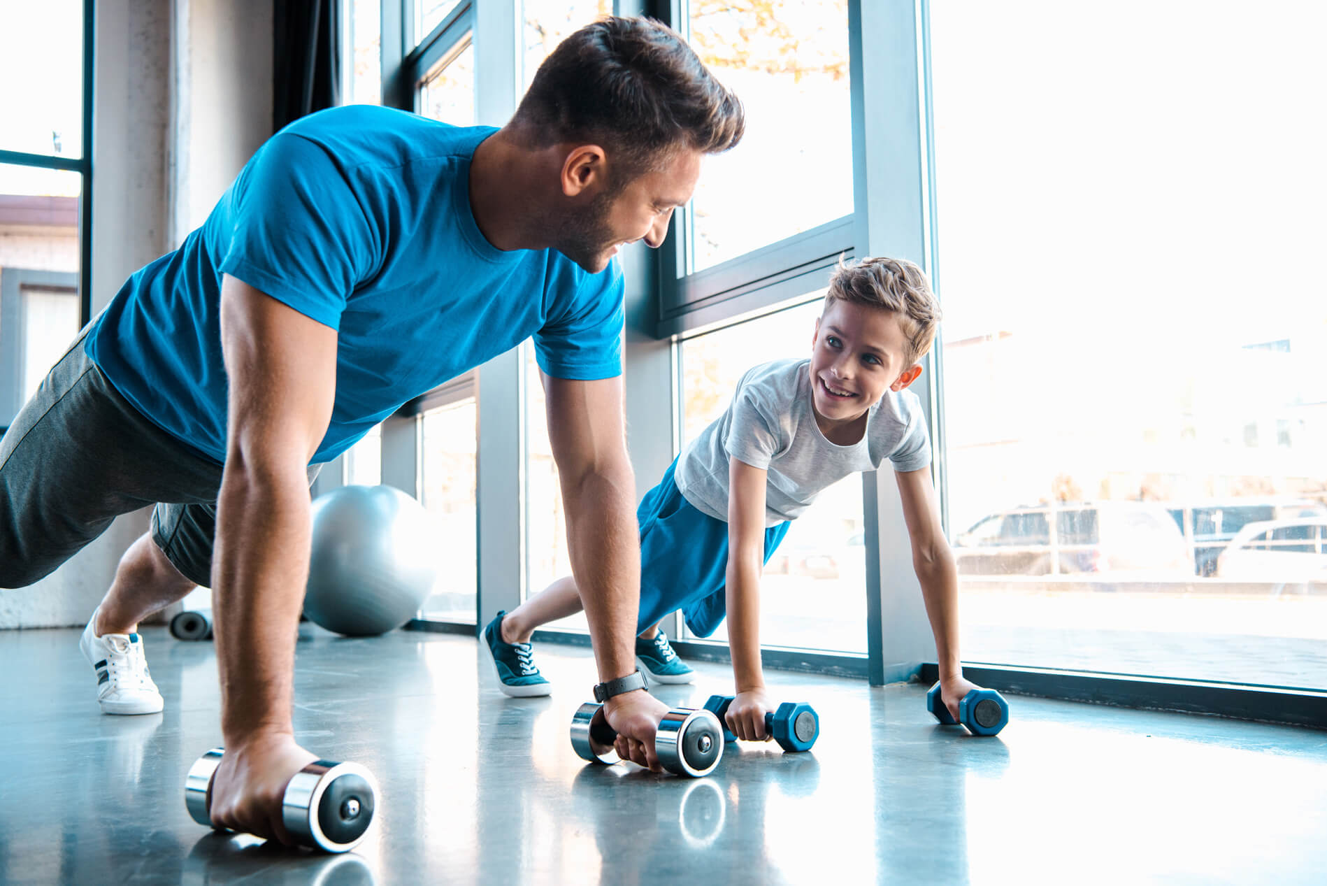 Father and son working out