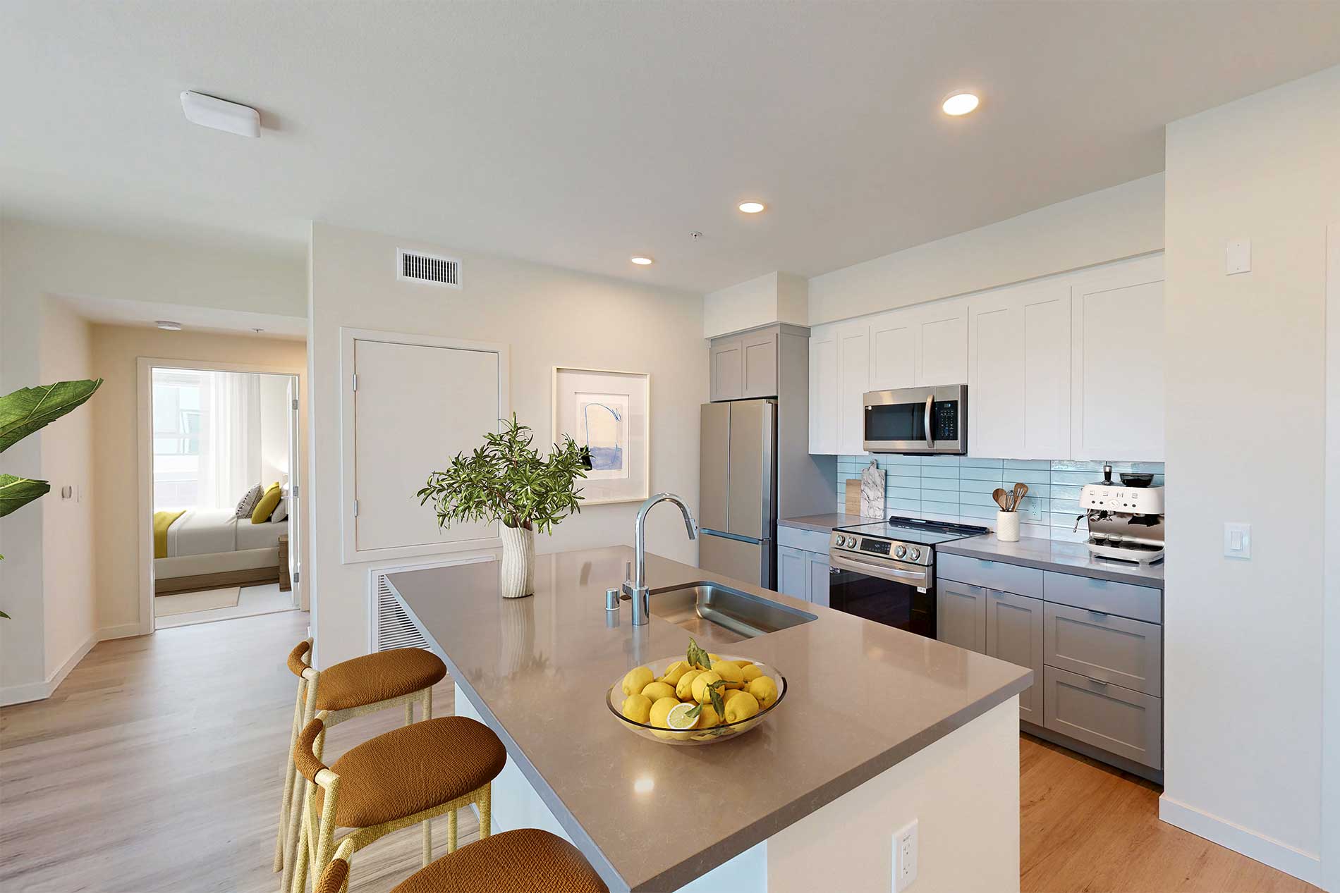 North Grove apartment kitchen with premium interiors, stainless steel appliances, and stylish finish package