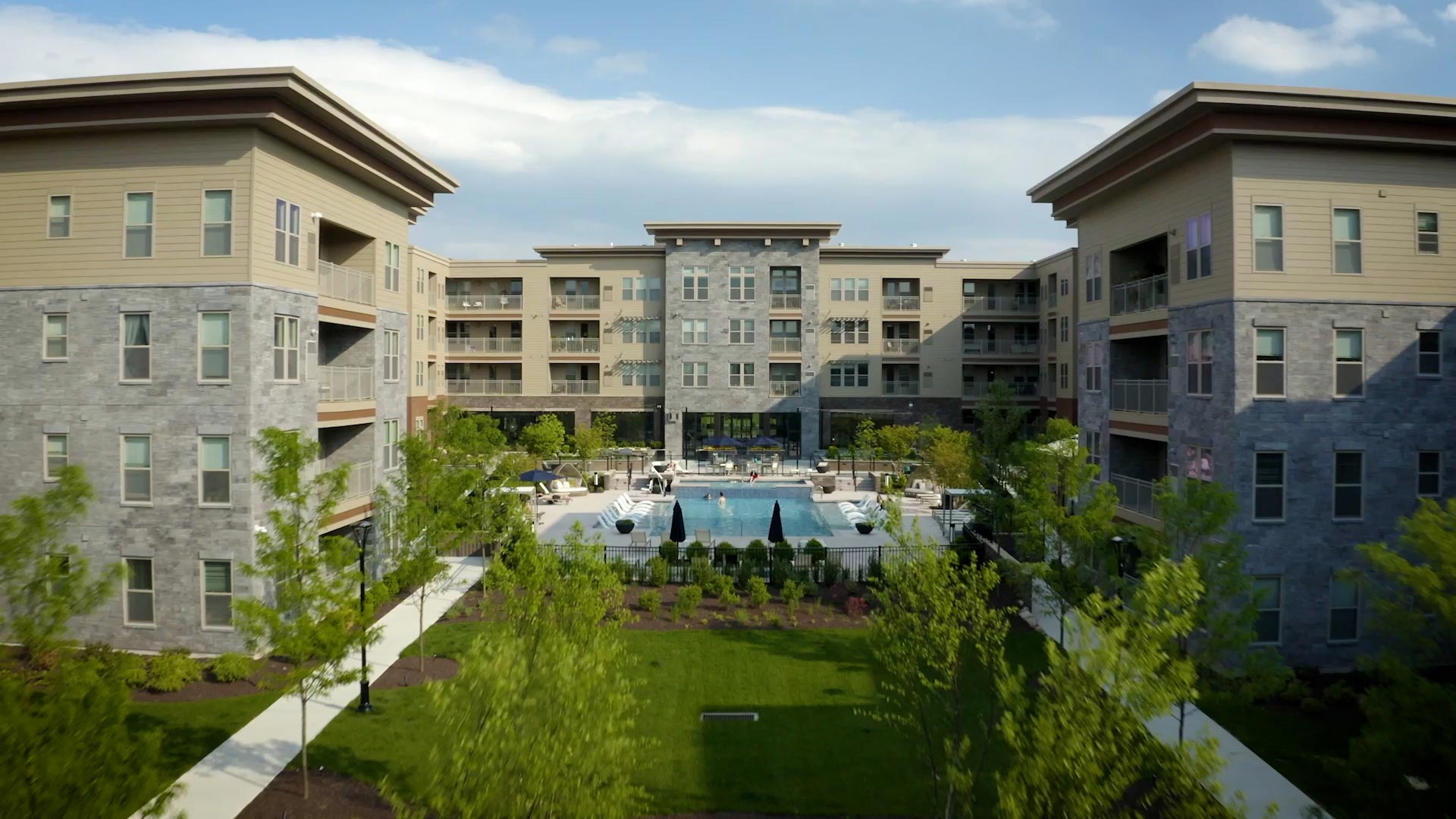 Park Square building exterior and pool