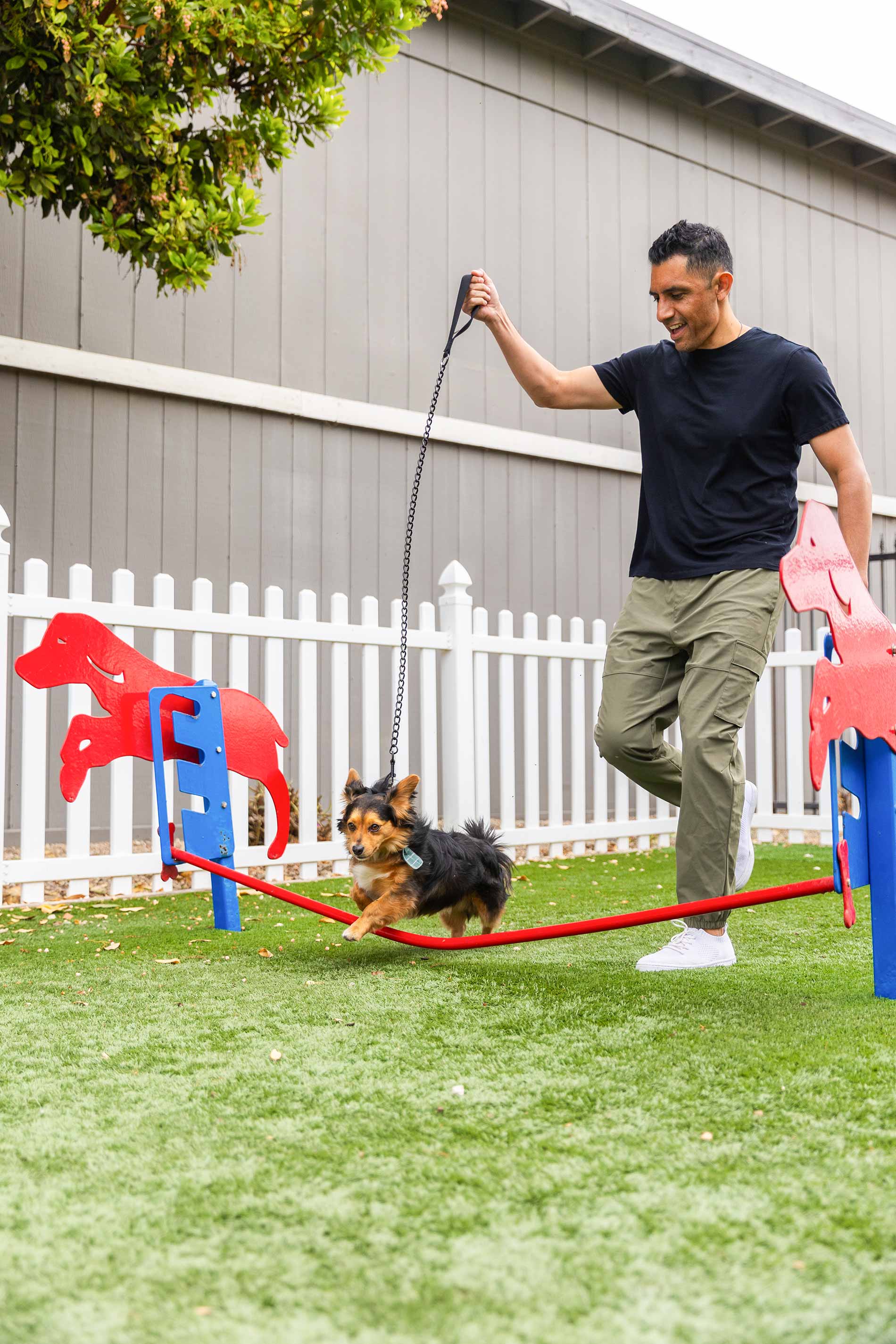 Pointe at Westlake man runs with dog in dog park
