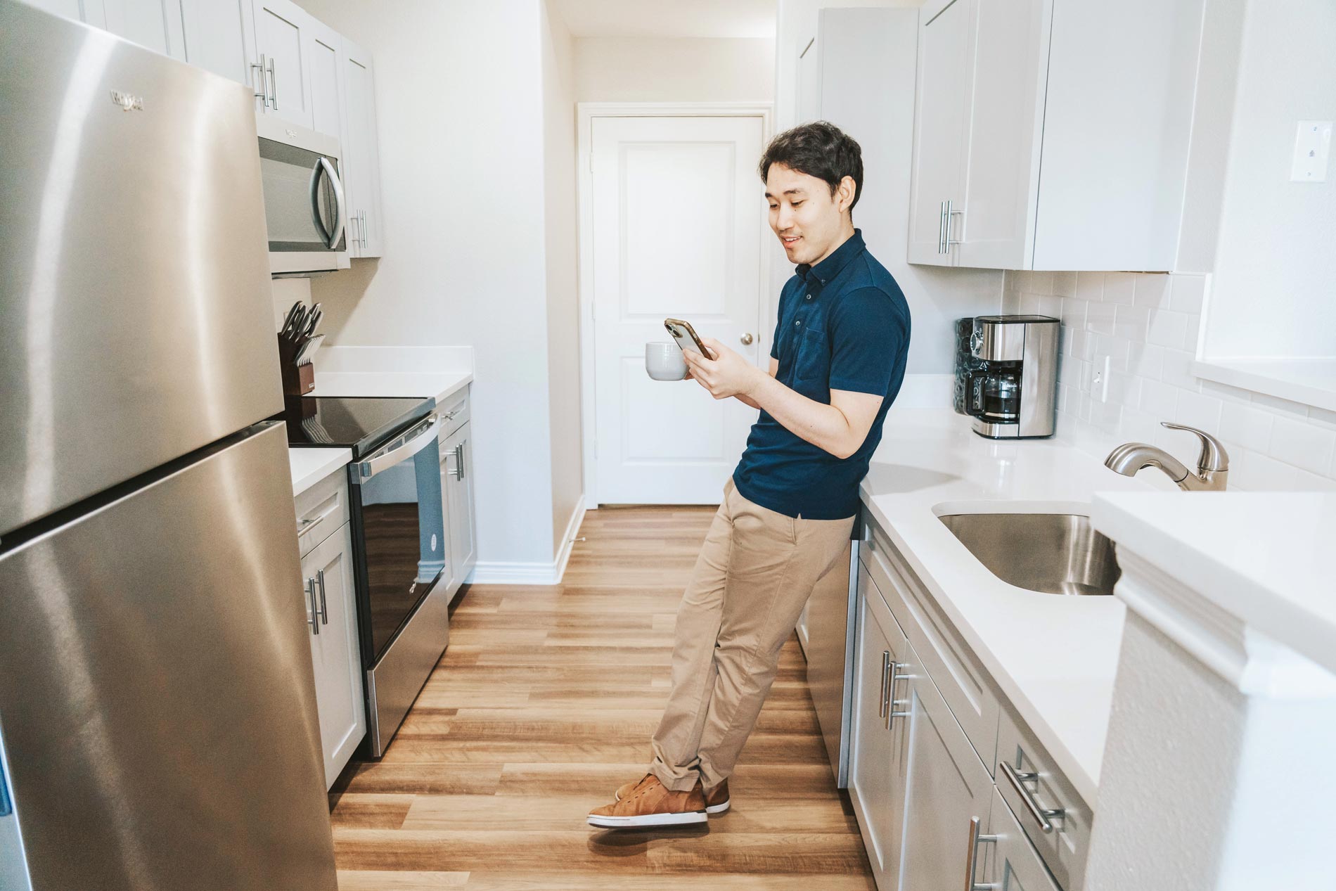 Ridge at Blue Hills man in kitchen 