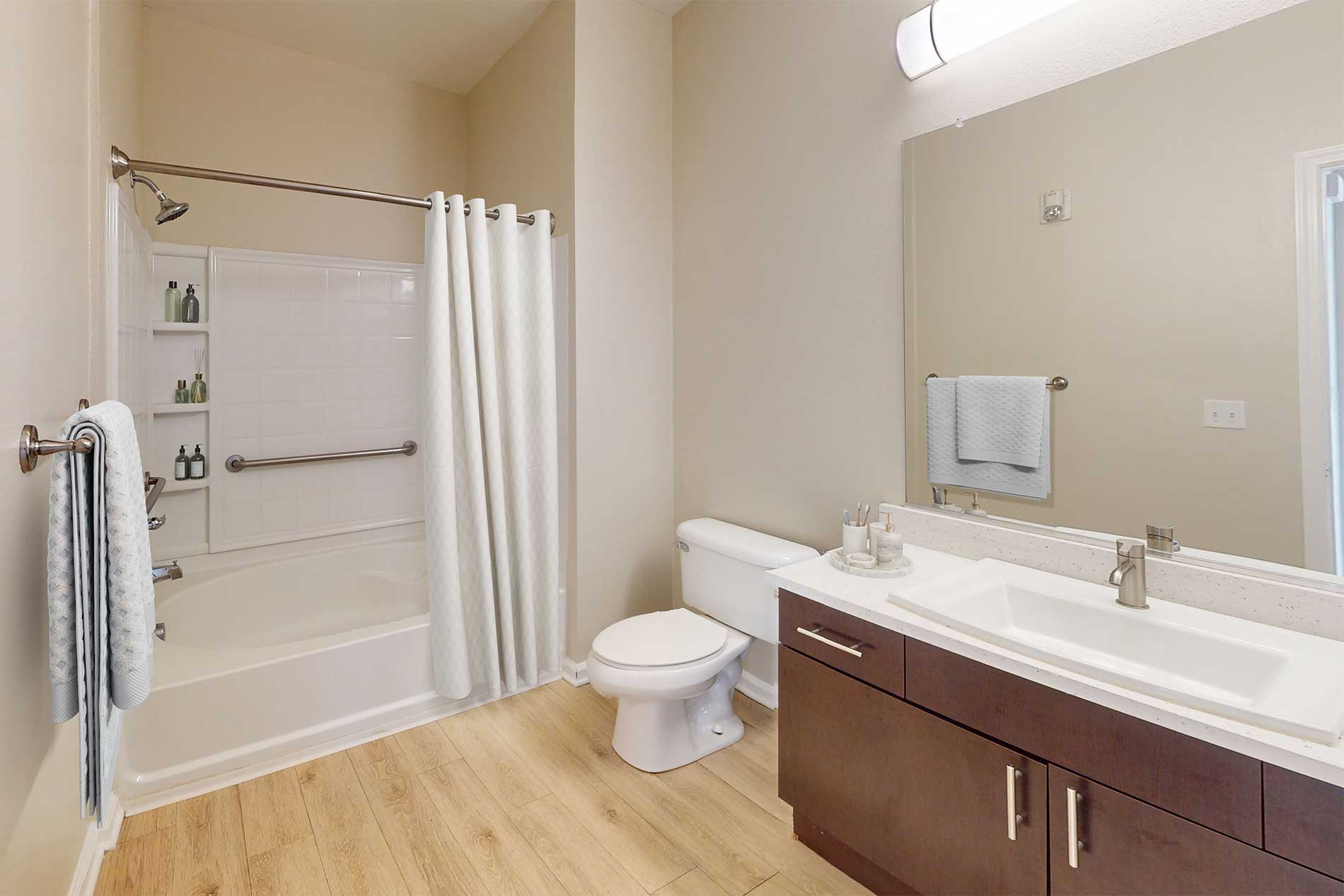 Bright apartment bathroom at River Terrace in Santa Clara.