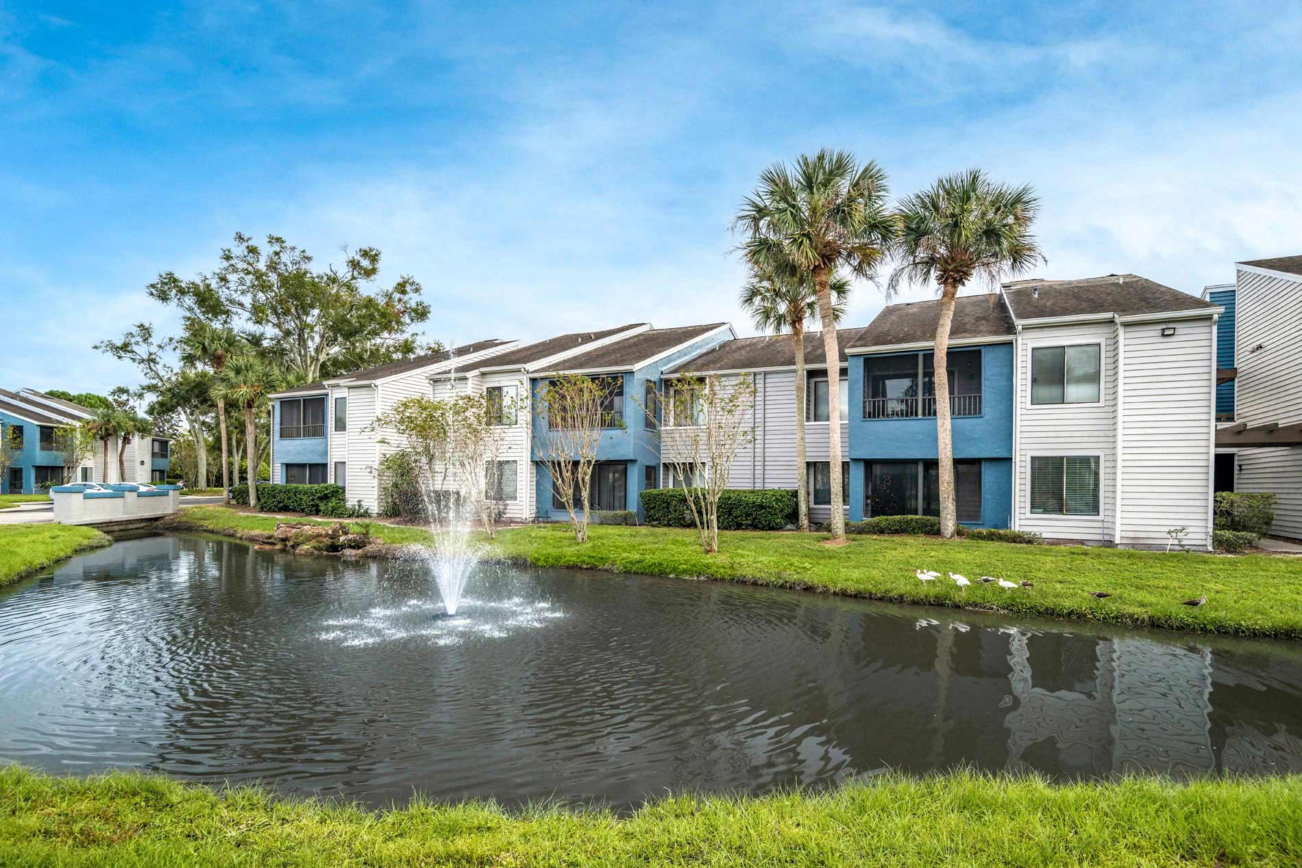 Seabrook building exterior and pond