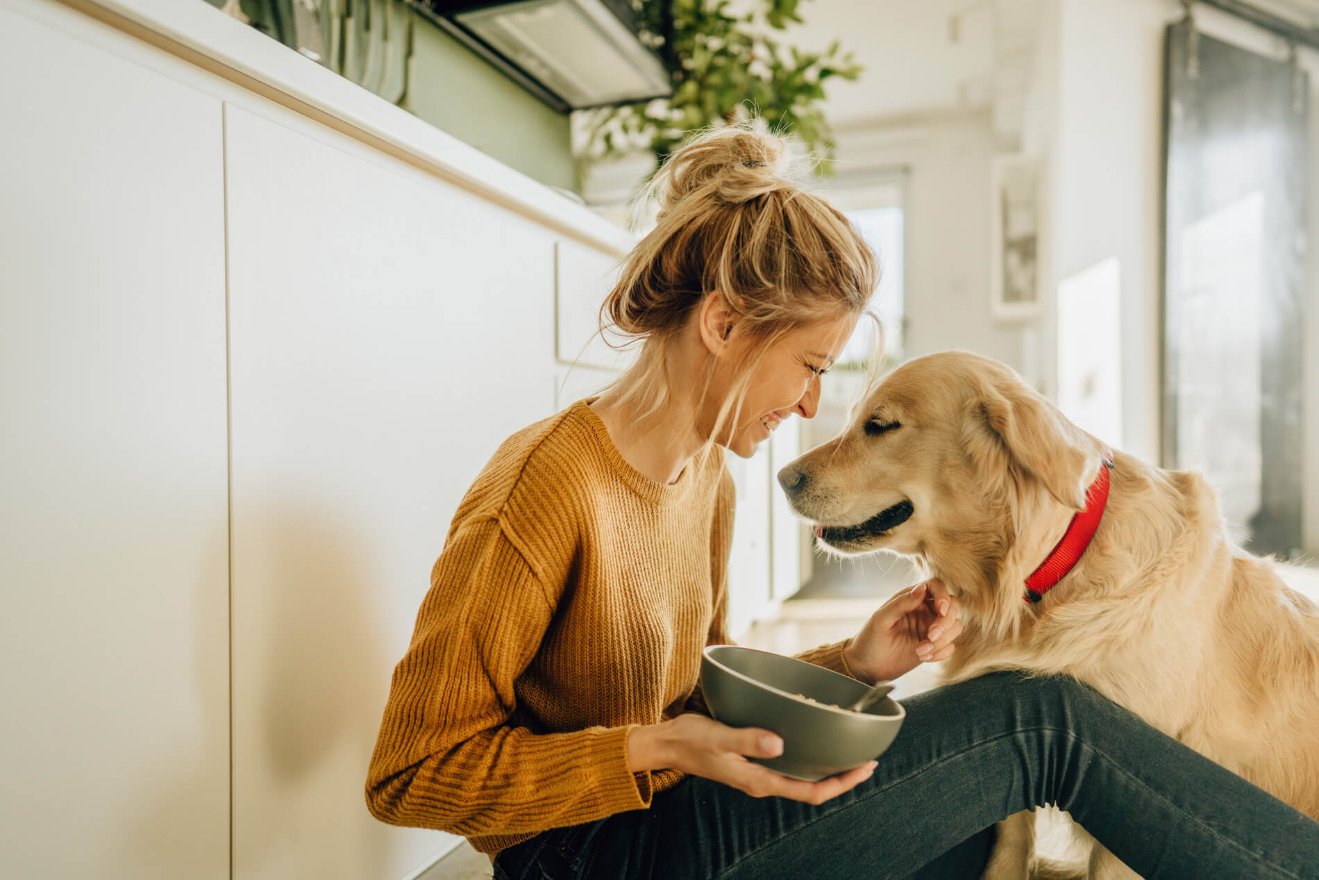 Girl sitting with her dog