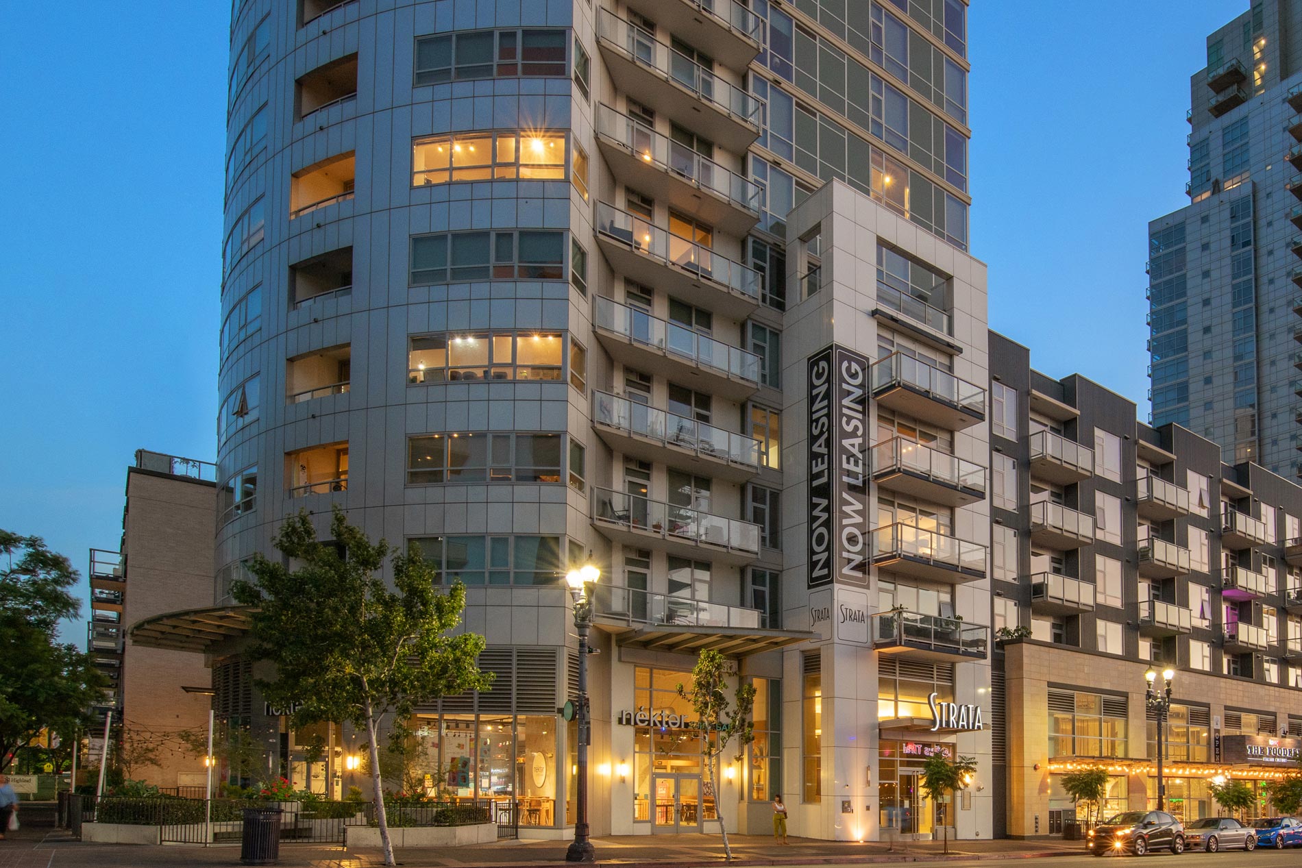 Strata building exterior at sunset