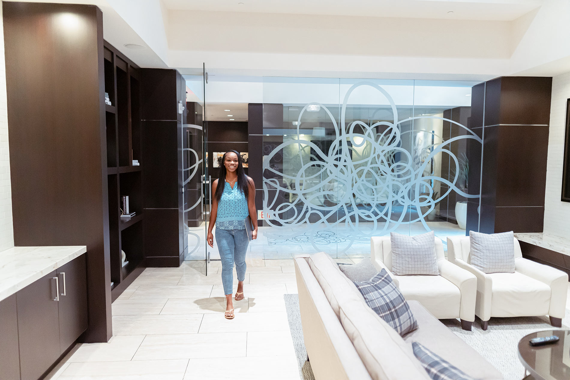 Strata woman walks through business center