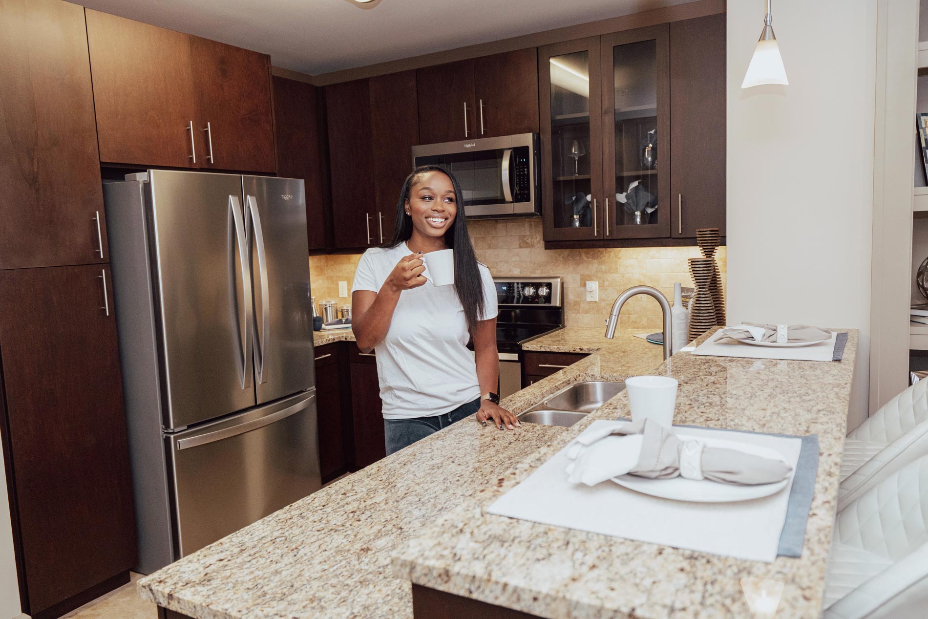 Strata woman in kitchen