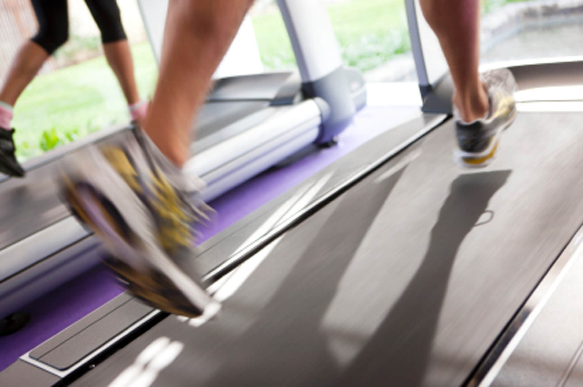 Person running on a treadmill