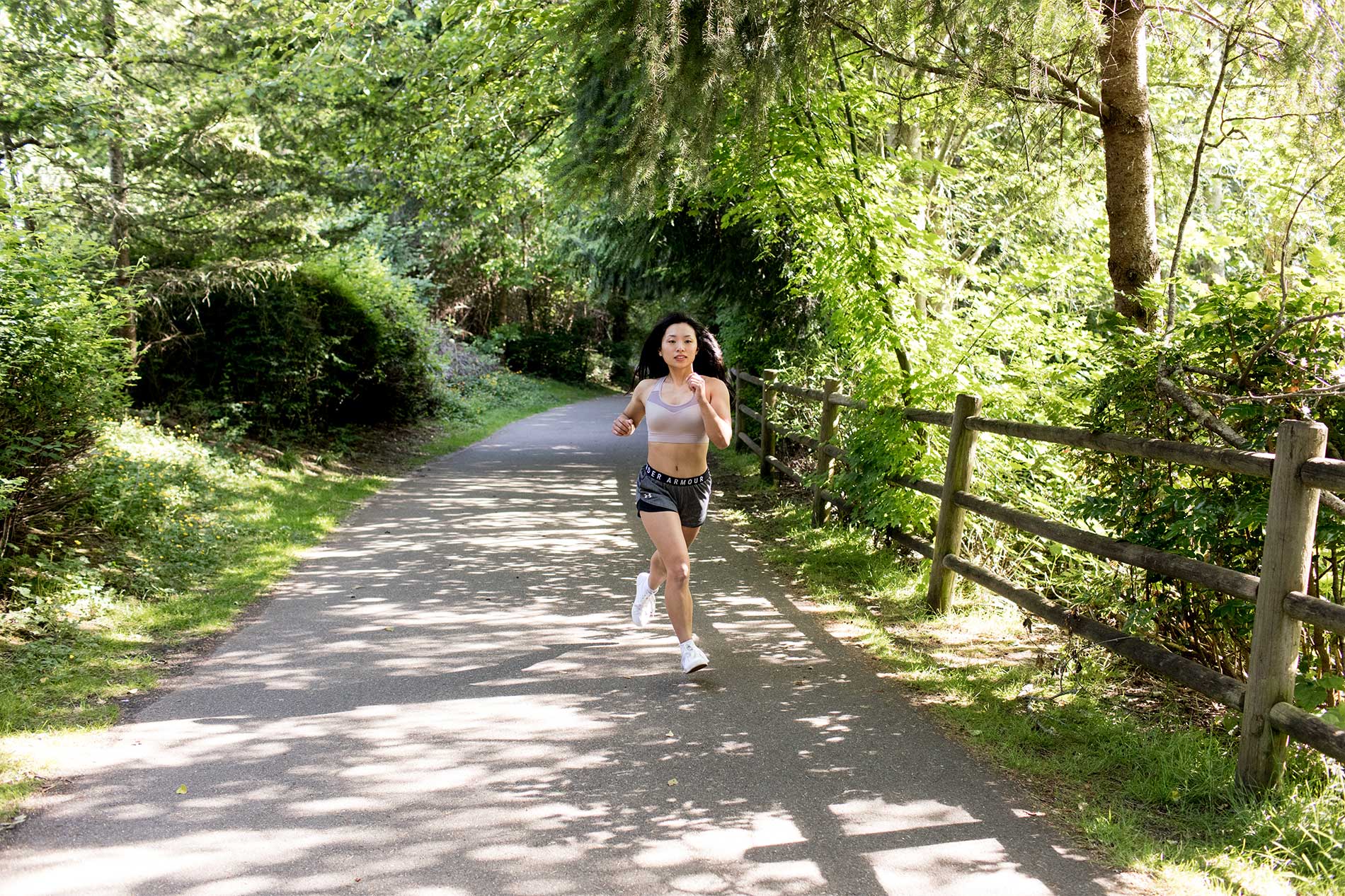 Woman running on trail