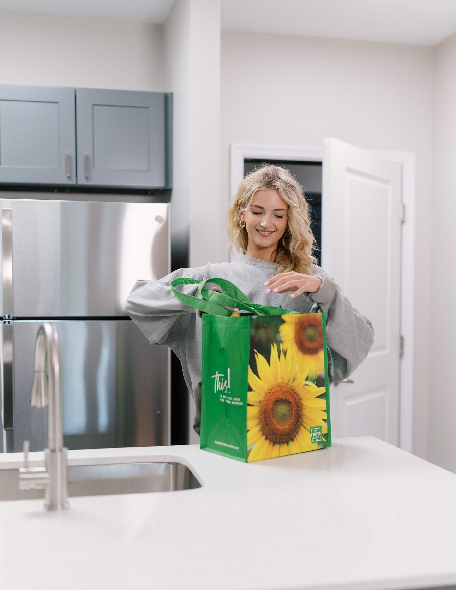 Quarters at Towson woman in kitchen