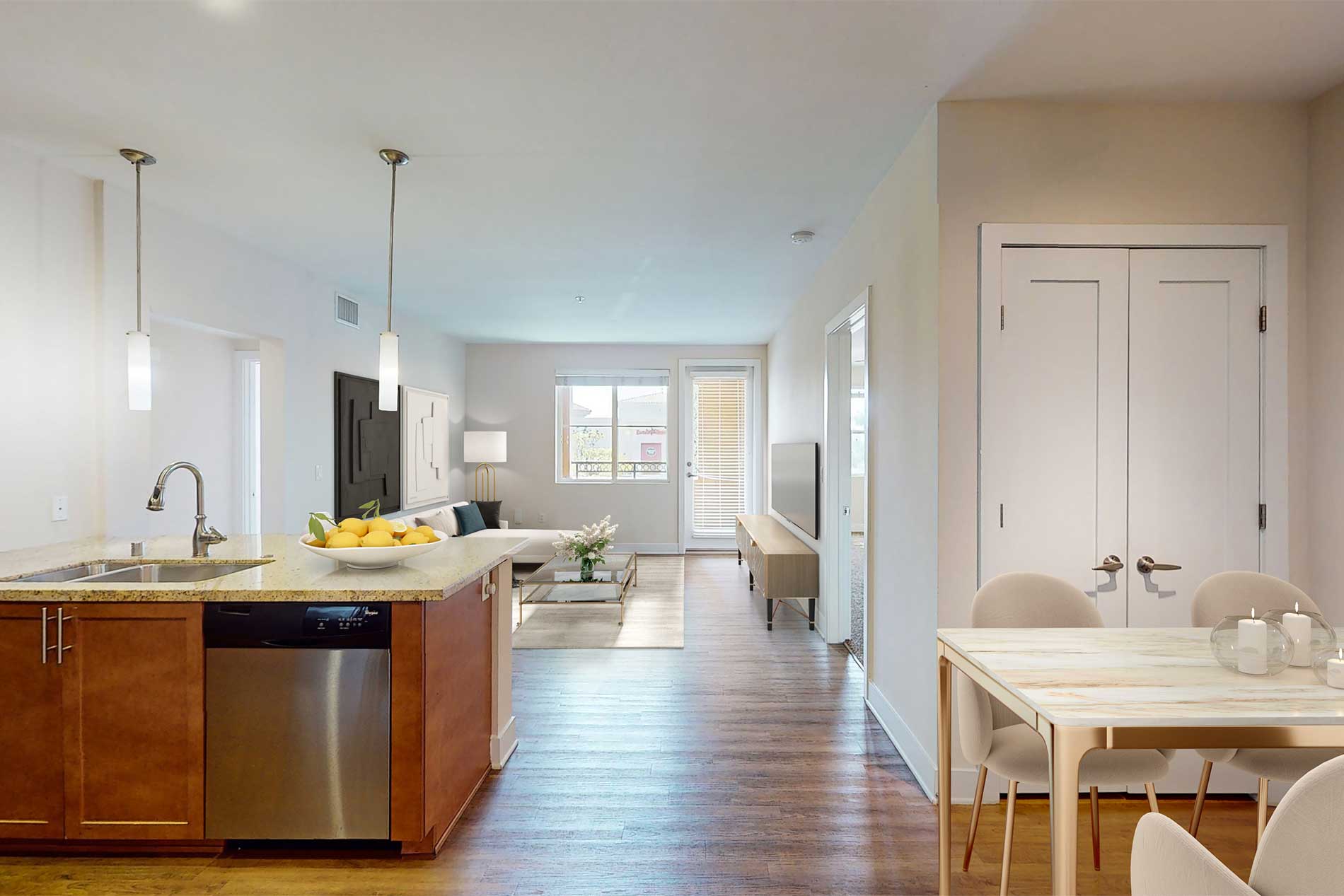 The Residences at Bella Terra apartment kitchen and living room