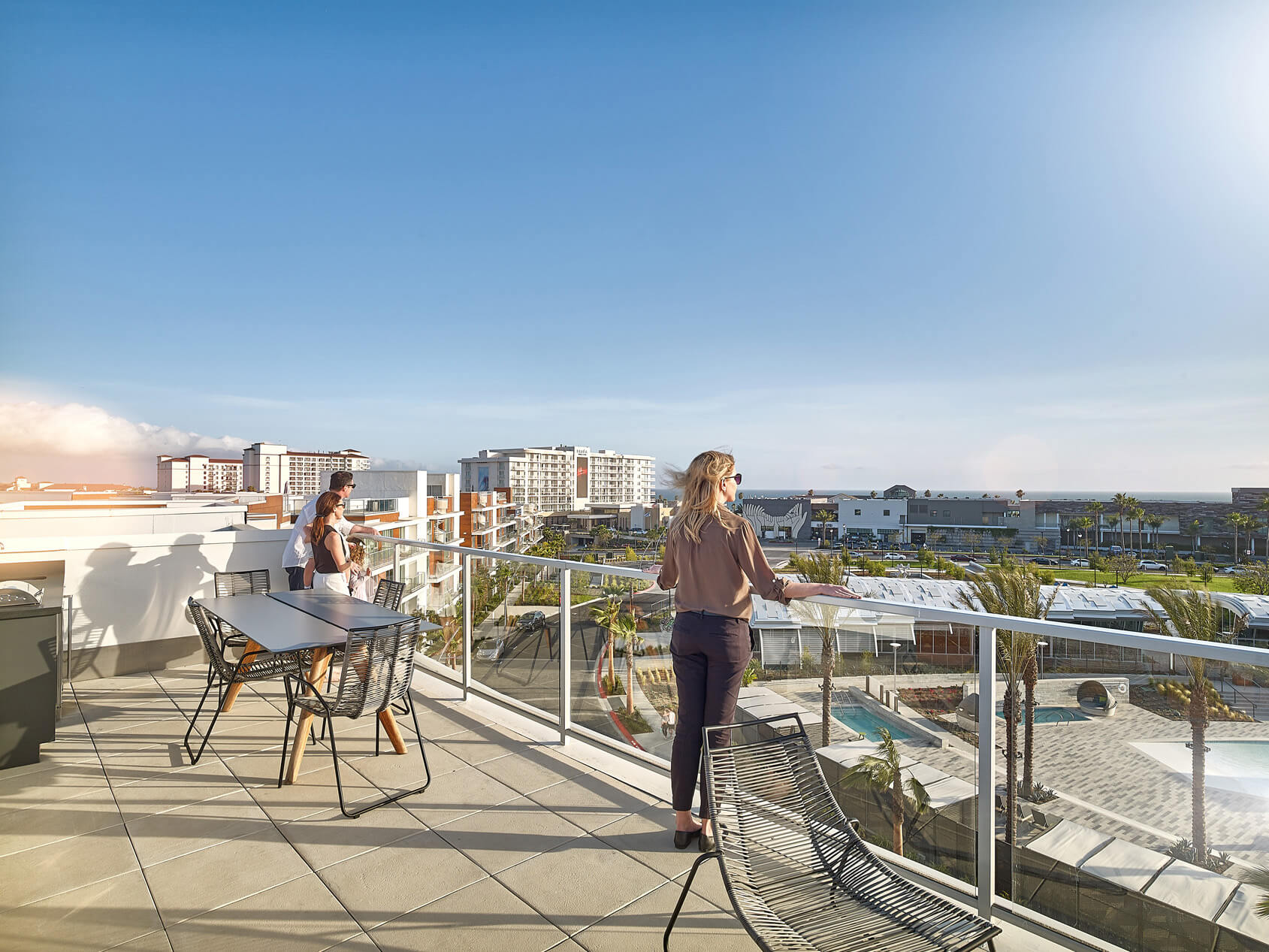 People standing on balcony 