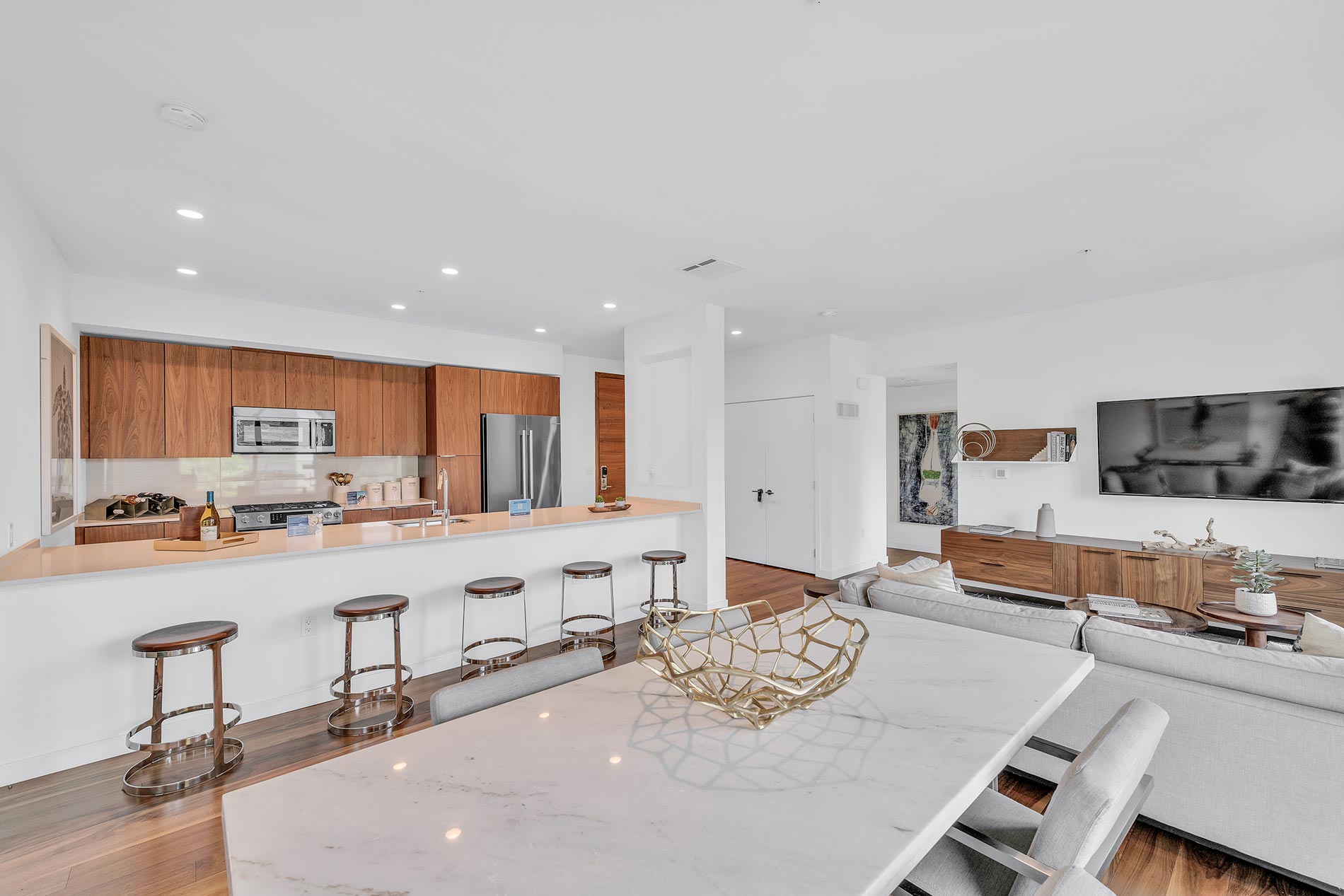 Residences at Pacific City Staged dining room and kitchen