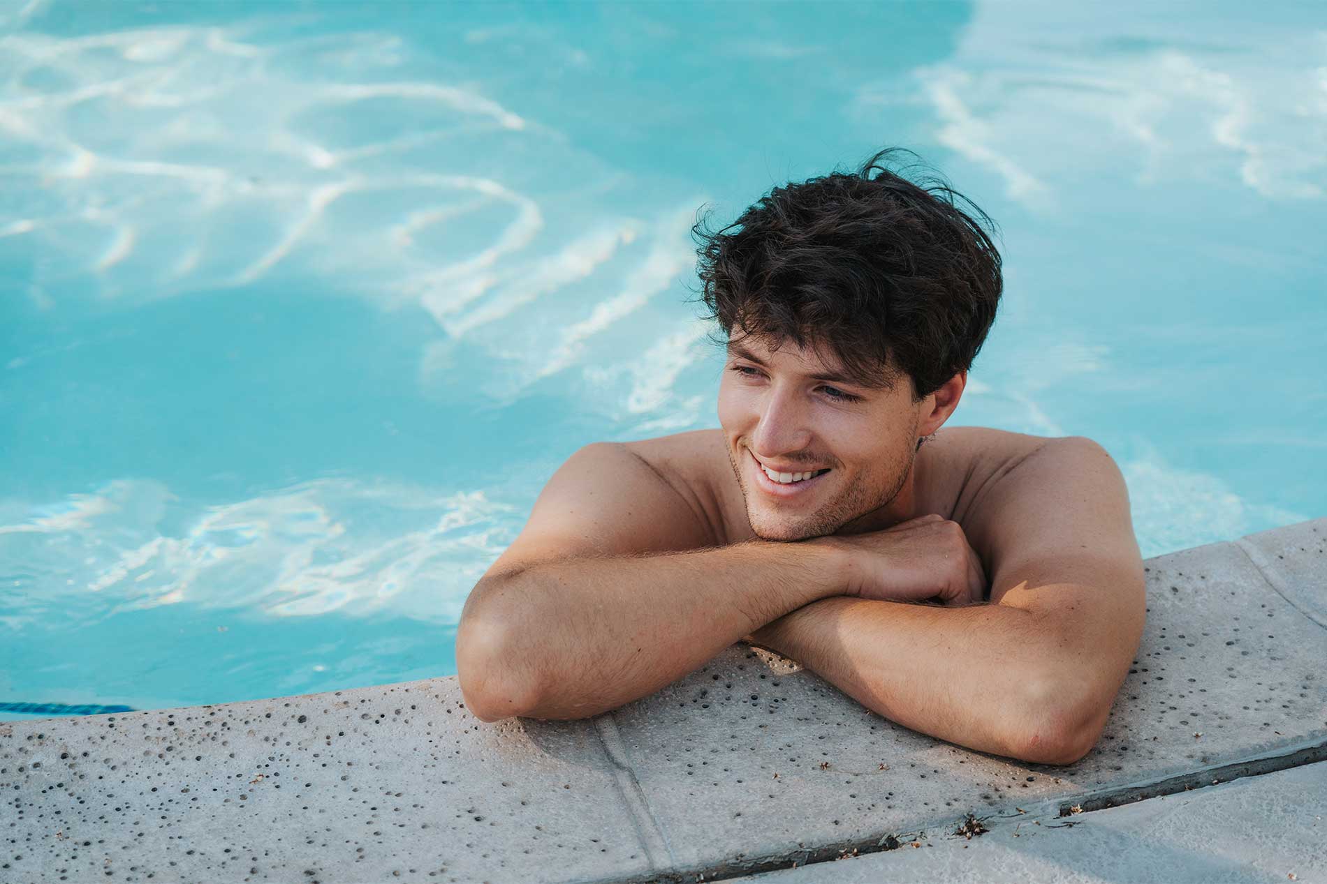 The Slade man swimming in the pool