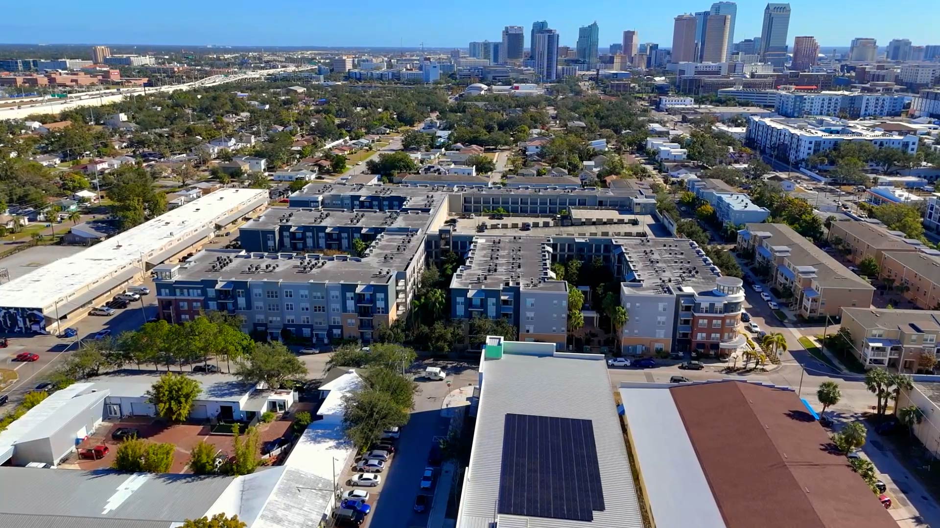 The Vintage Lofts at West End aerial building exterior with downtown views
