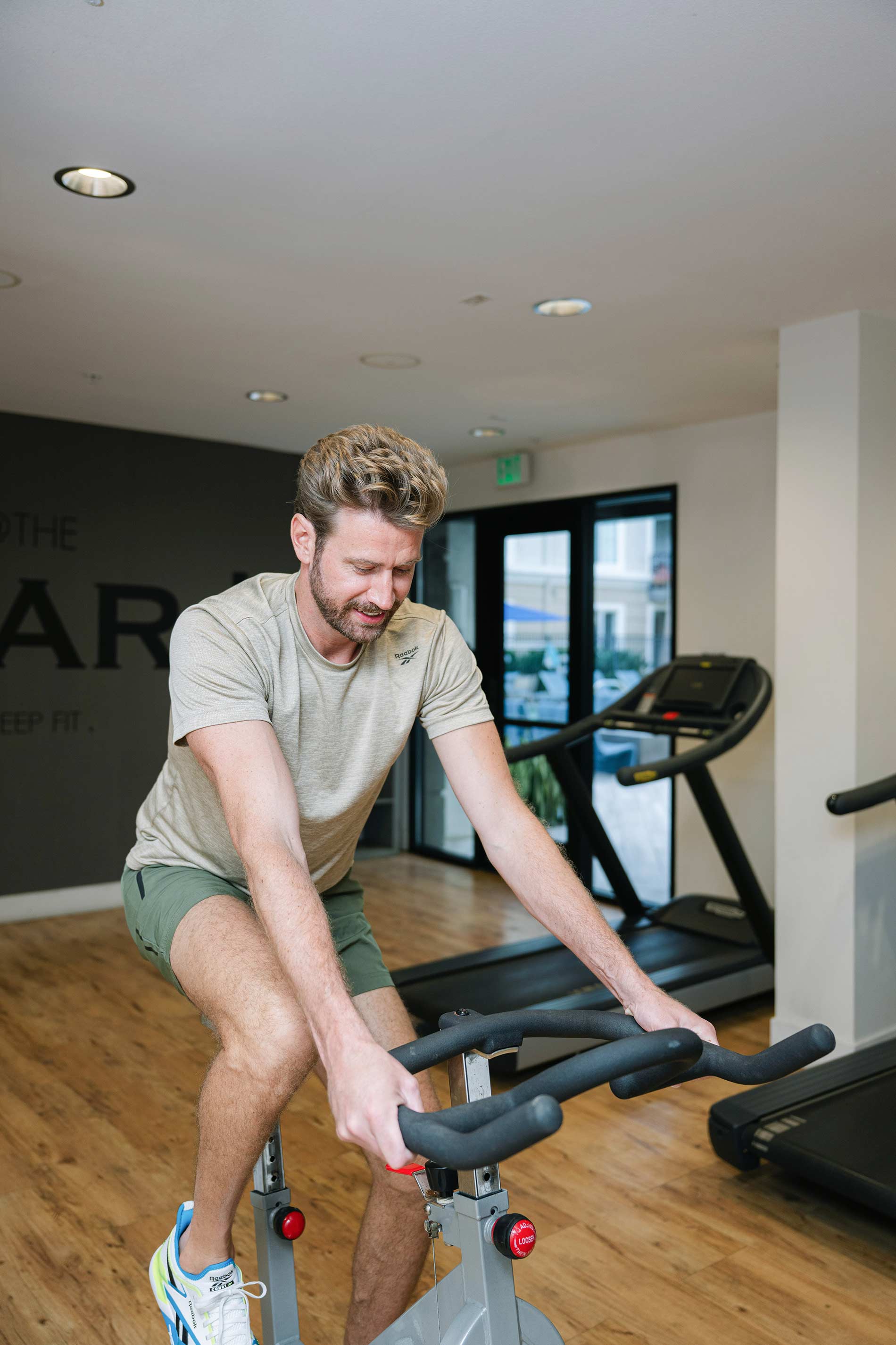 Tierra Del Rey man rides stationary bike in fitness center