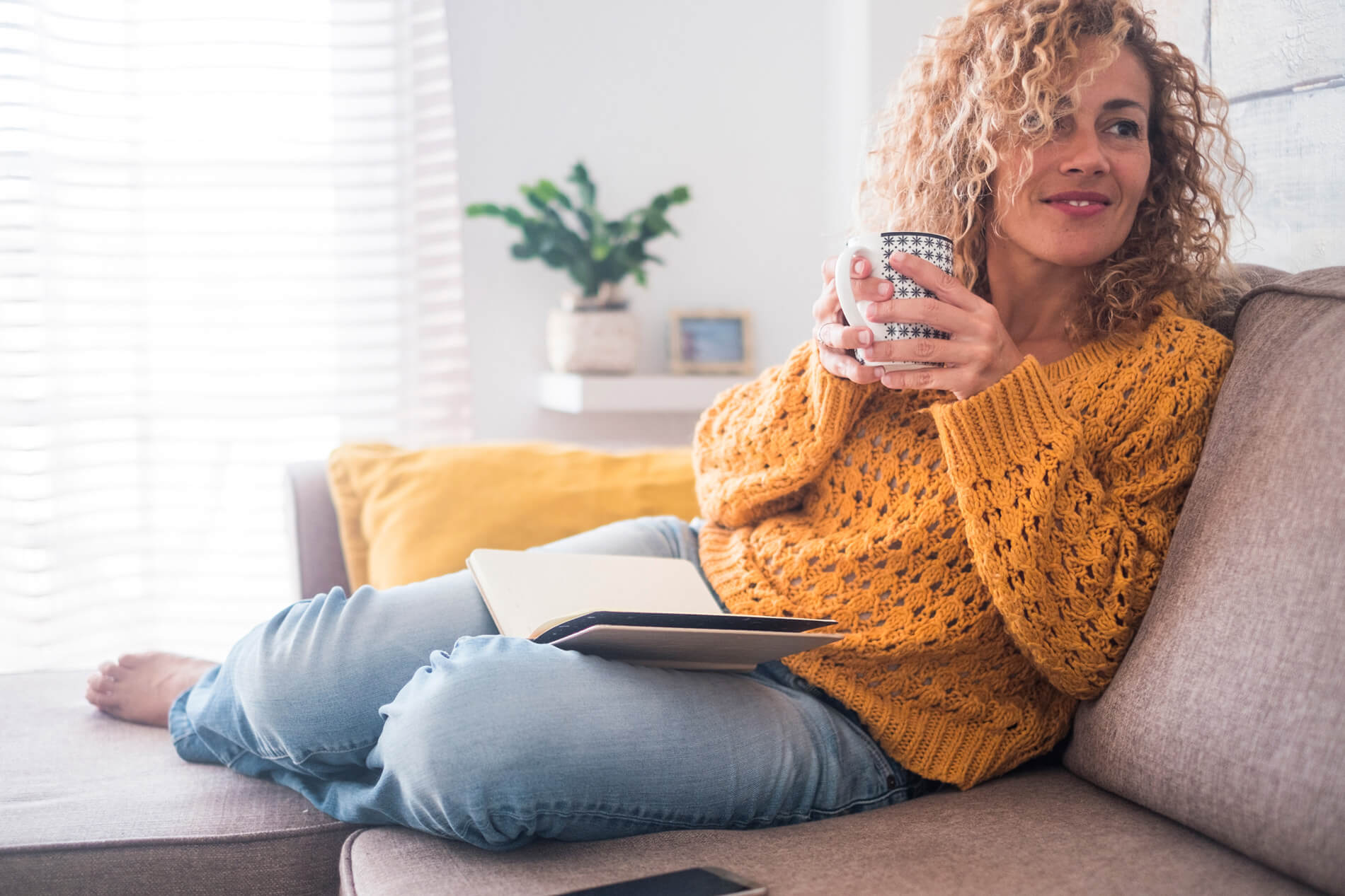 Woman sitting on the couch